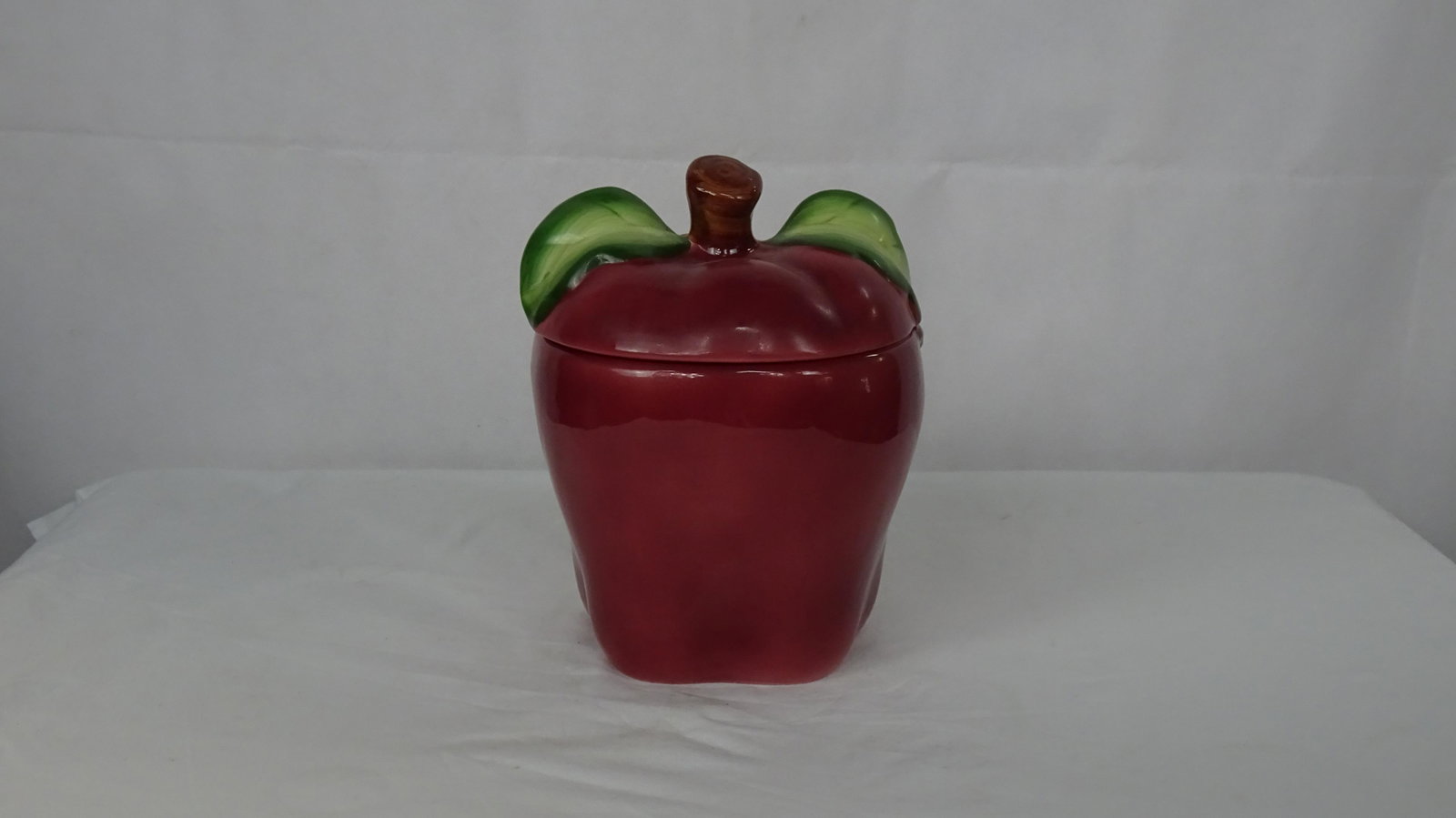 Ceramic Apple Cookie Jar: Ceramic Apple Cookie Jar. 10"H in good condition.