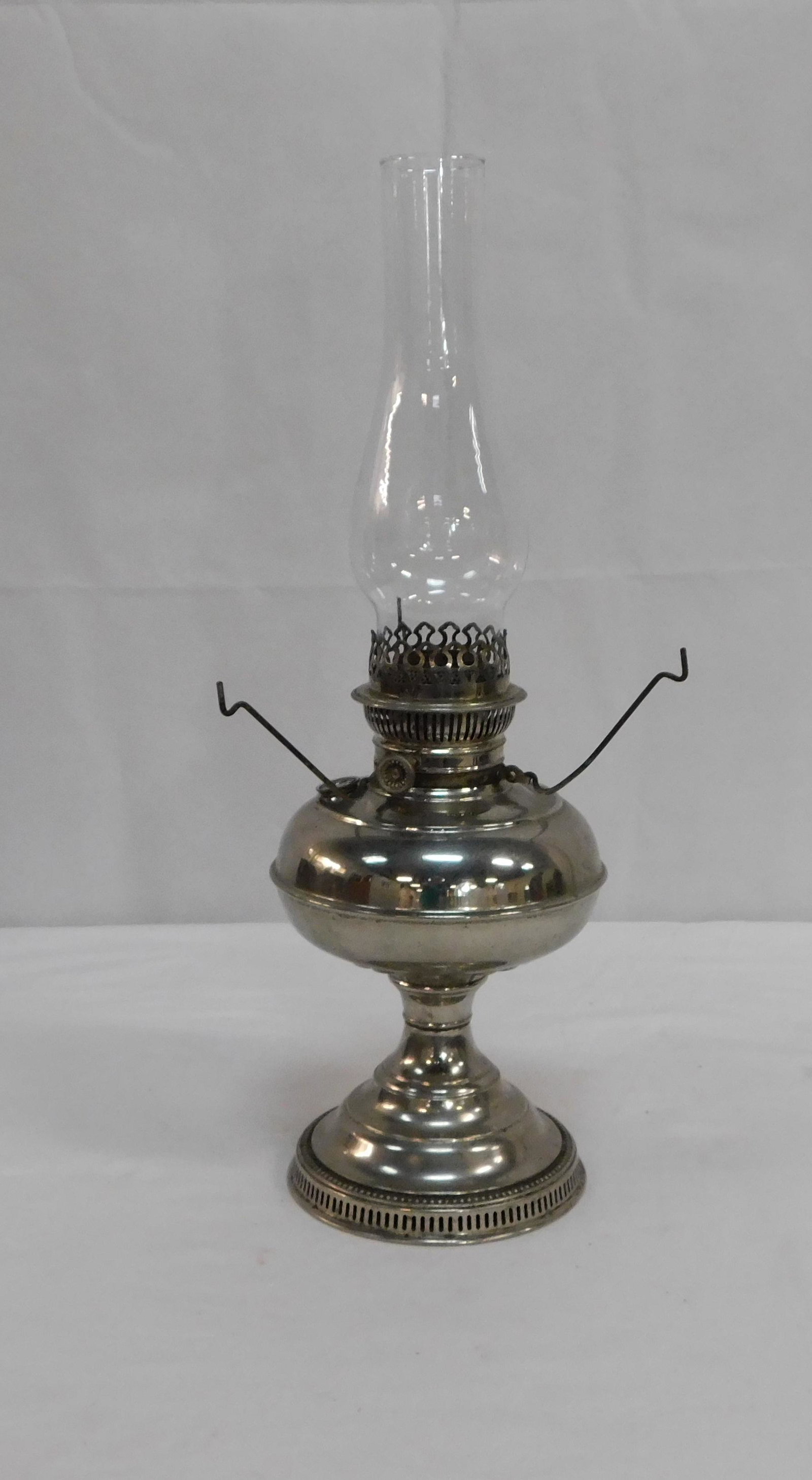 Rayo Silverplate Oil Lamp: Rayo Silverplate Oil Lamp in good condition, 12''H with 10''Shade