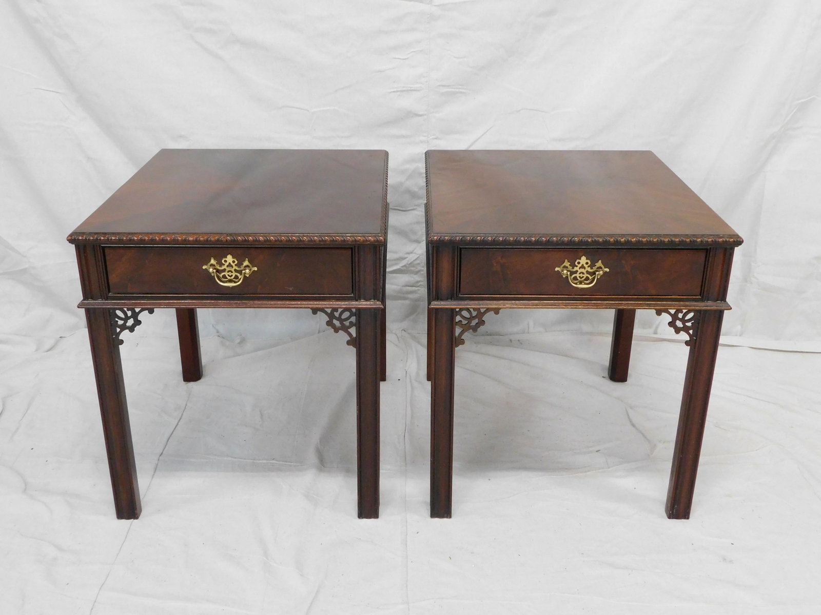 2 Hickory Chair James River Chippendale End Tables: 2 Hickory Chair James River Chippendale End Tables in good condition, with one table missing fret work off side of leg on side of table, Burn in mark in both drawers, Mahogany, dovetailed drawers, bra