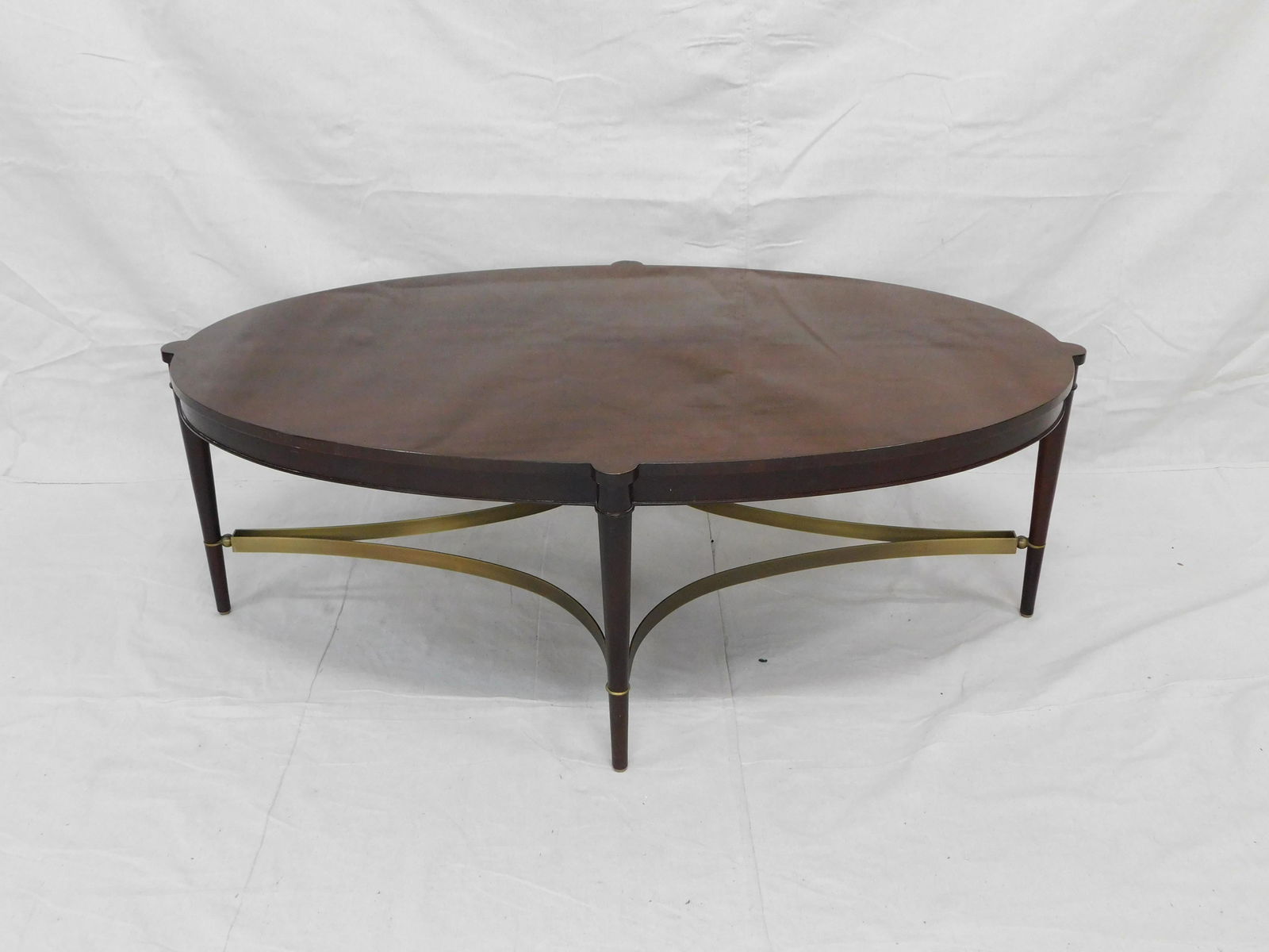 Baker Thomas Pheasant Collection Coffee Table: Baker Thomas Pheasant Collection Coffee Table in good condition, Solid Wood Construction with iron accented stretcher base, 16.5''H x 48.5''W x 30.75''D, MSRP $2350