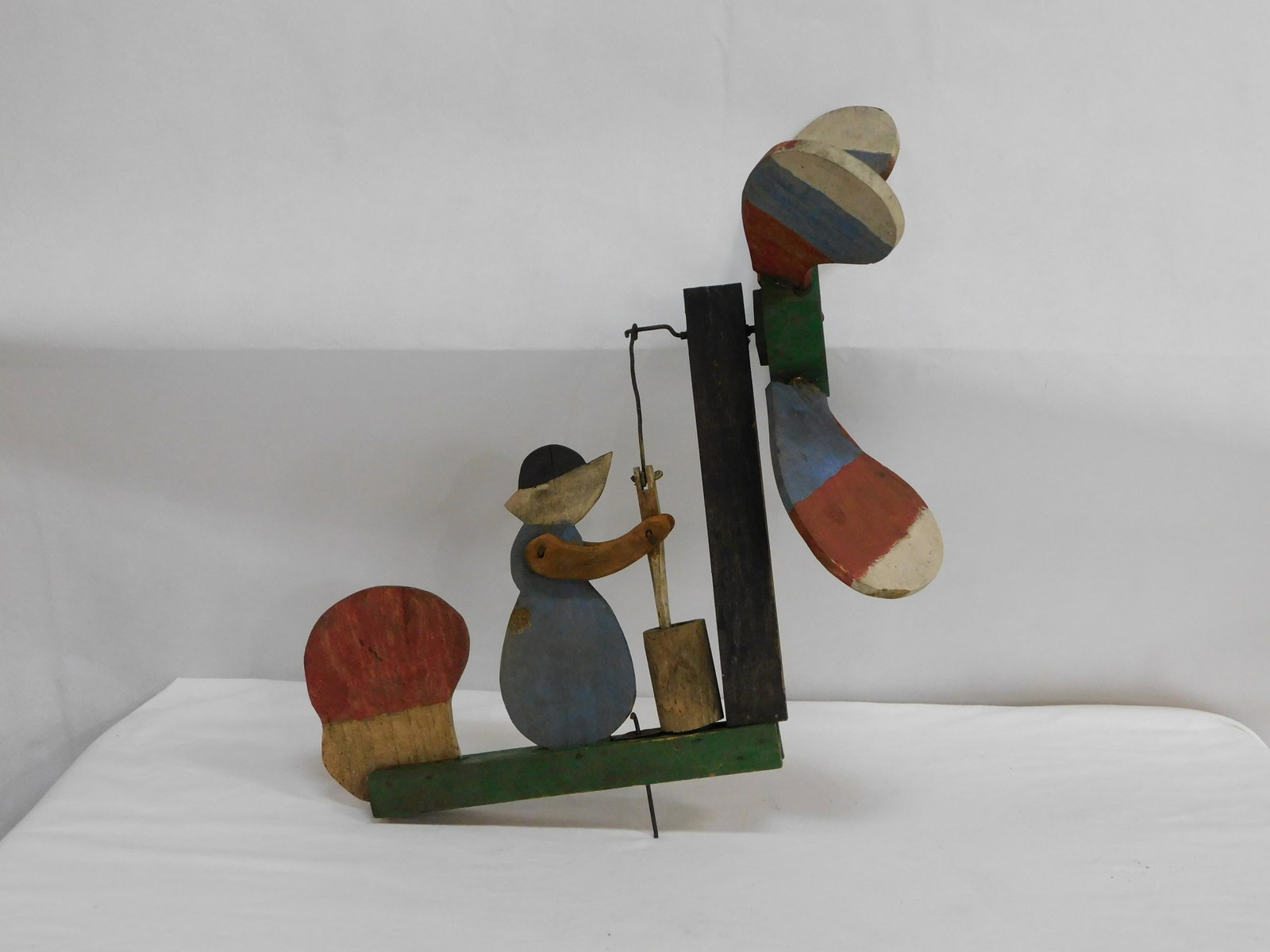 Vintage Folk Art Whirligig Churning Butter: Vintage Folk Art Whirligig Churning Butter in good working condition. 15" overall height.
