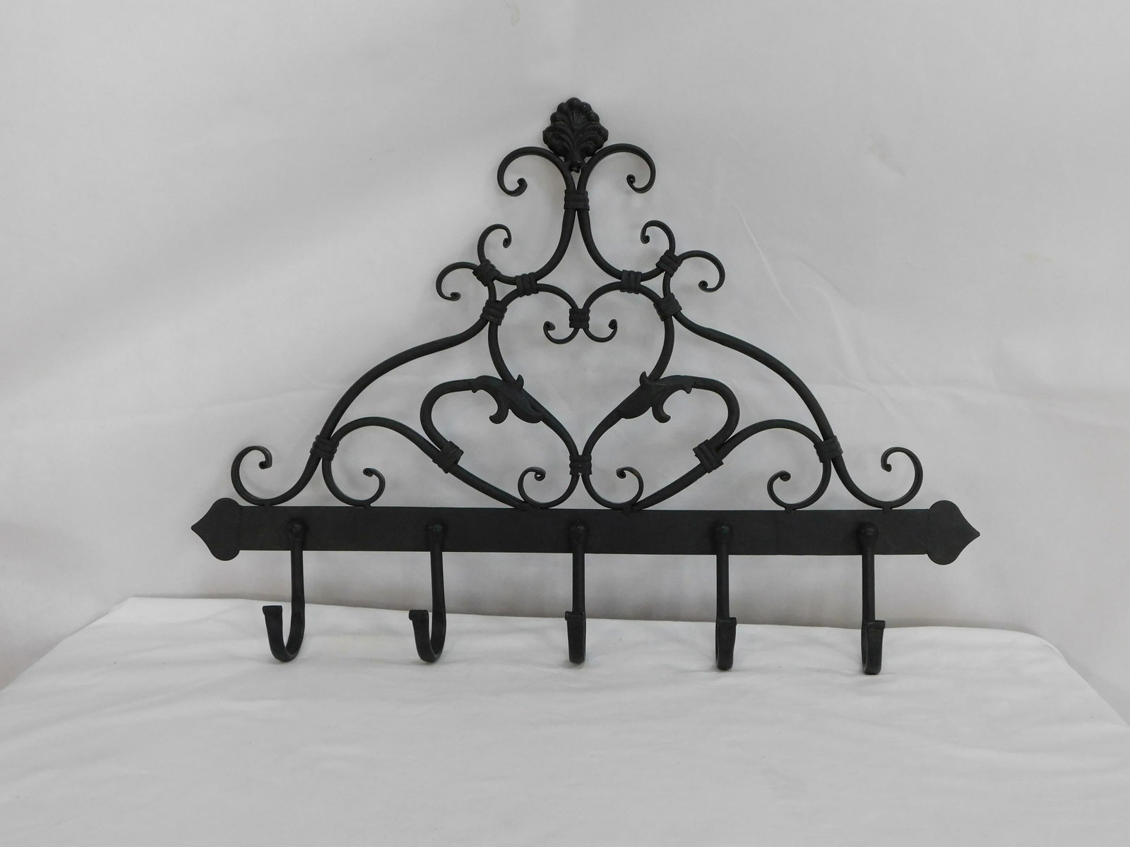 Wrought Iron Coat Rack: Wrought Iron Coat Rack in good condition, 19''H x 27''W