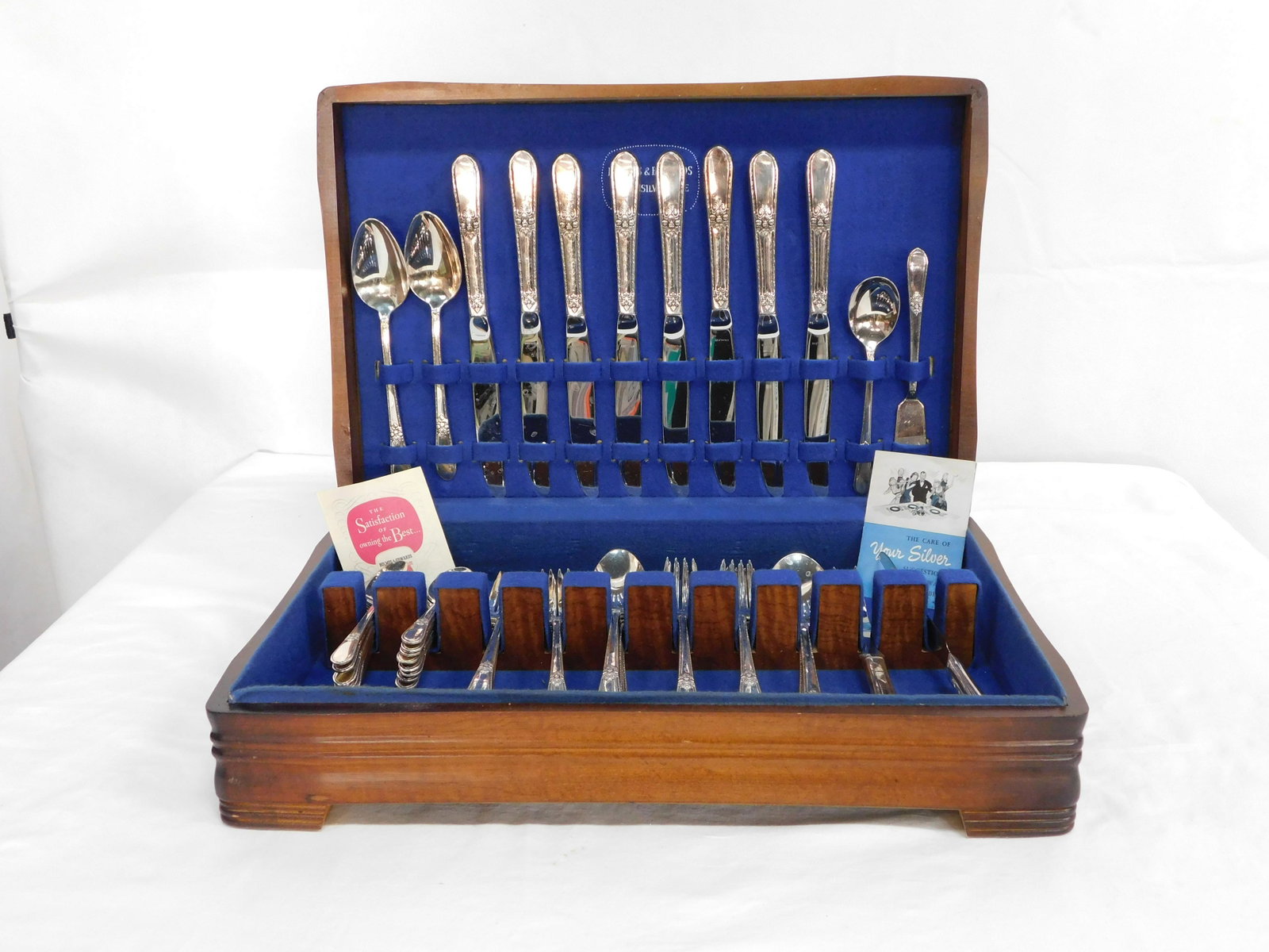 54pcs 1847 Rogers Bros "Adoration" Silverware: 54pcs 1847 Rogers Bros "Adoration" Silverware in good condition with light surface scratches, 5pc place setting with Hostess set, Service for 8, plus serving pcs, includes box