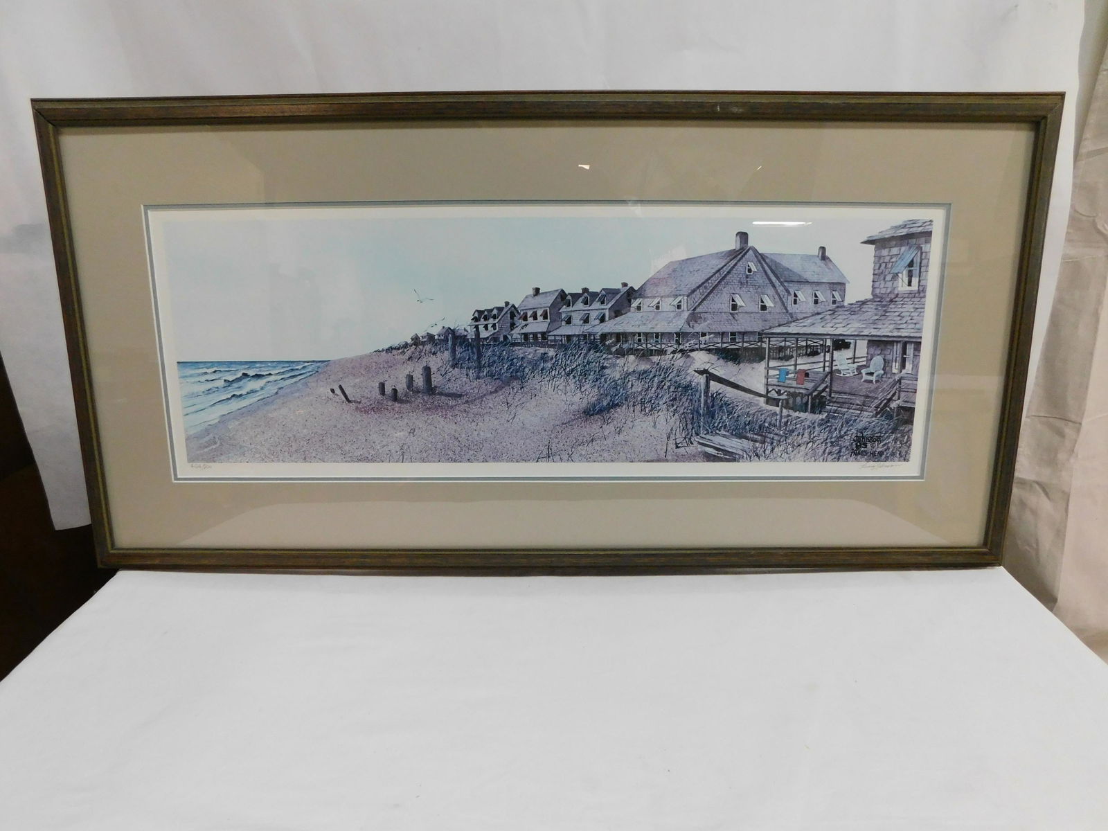 "Nags Head" Print Signed & Numbered Larry Johnson: Nags Head" Print Pencil Signed & Numbered by Larry Johnson in good condition. Nicely framed under glass with double mat. Overall frame size 17.75" x 35.5