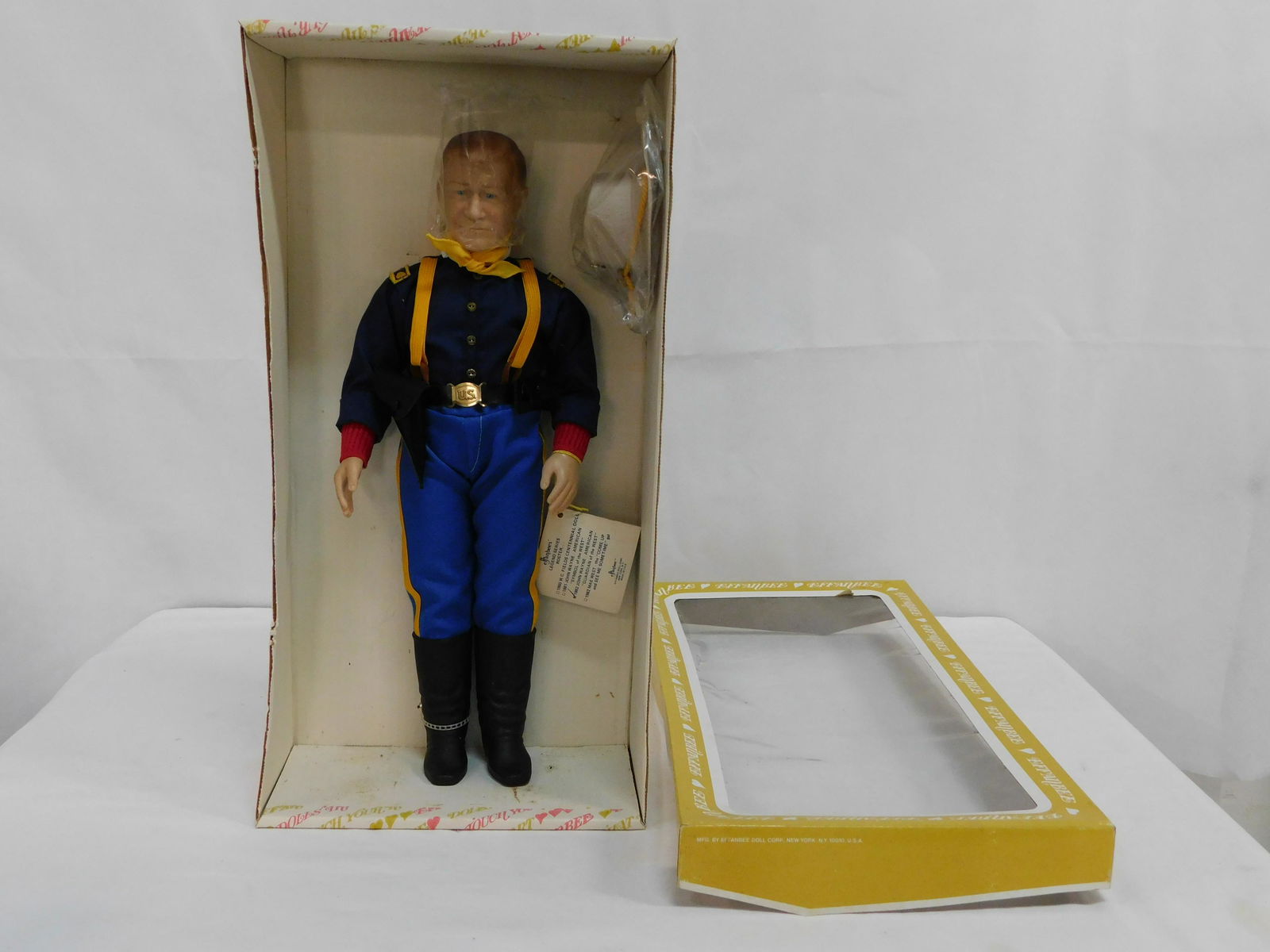 Vintage 17" Effanbee John Wayne Doll in Box: Vintage 17" Effanbee John Wayne Doll in Box. "American Guardian of the West" #2981 all original, never removed from box with hang tag. Toy Six Shooter included in holster. In good condition withlight
