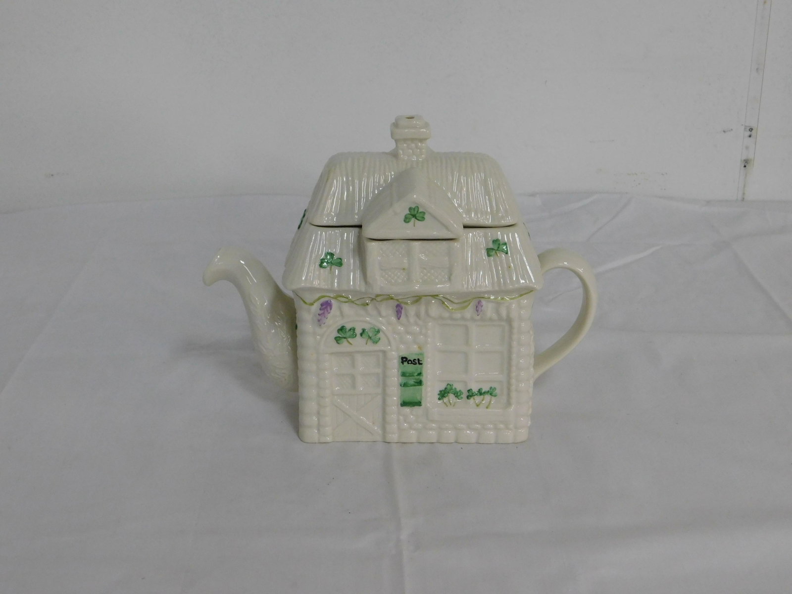 Irish Belleek Shamrock Post Office Teapot: Irish Belleek Shamrock Post Office Teapot. 7" H x 9.5" L x 4.75" W in good condition.