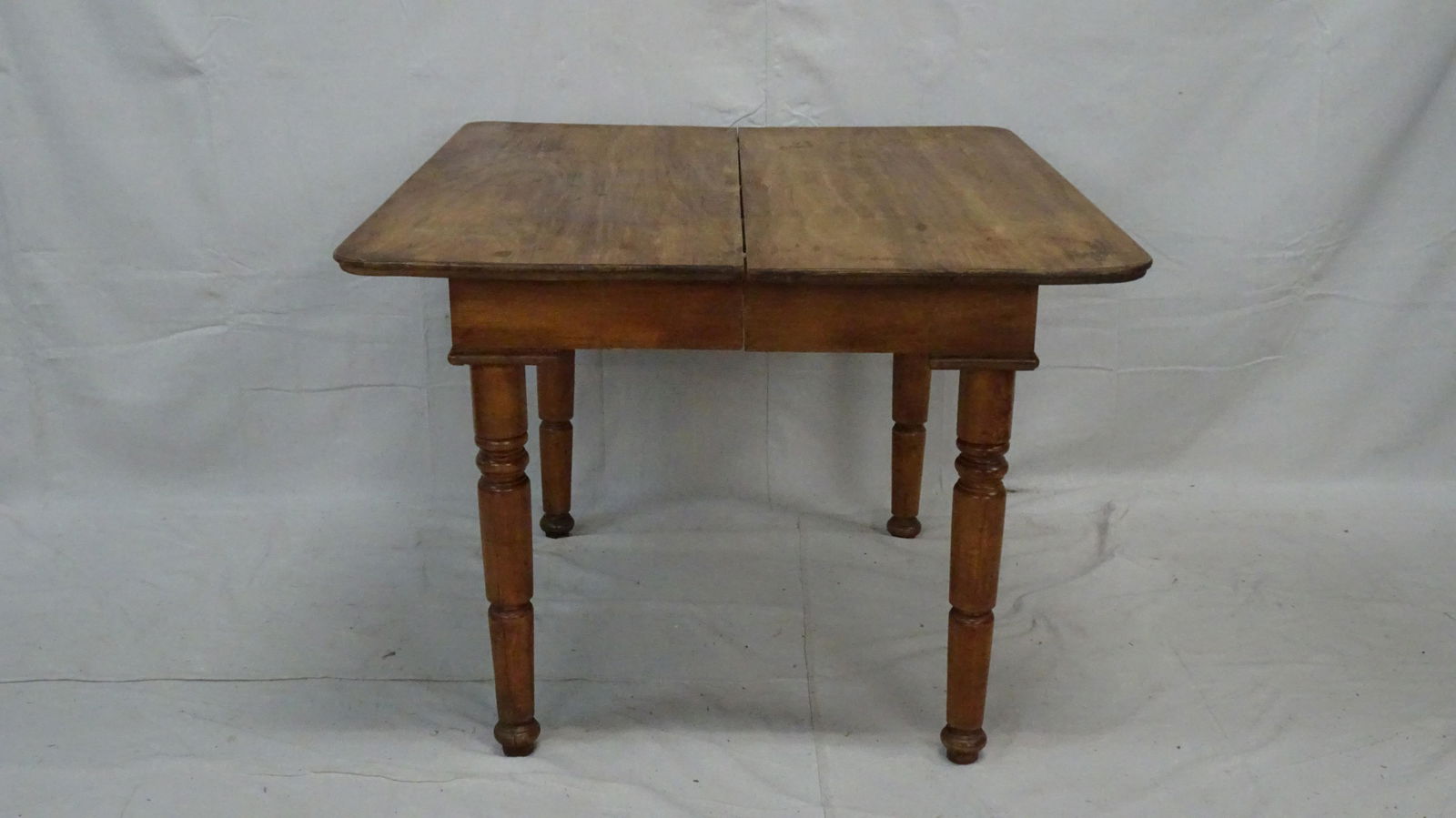 Antique Primitive Dining Table: Antique Primitive Dining Table in good condition with Two 11'' Leaves, 28''H x 37''W x 42''L