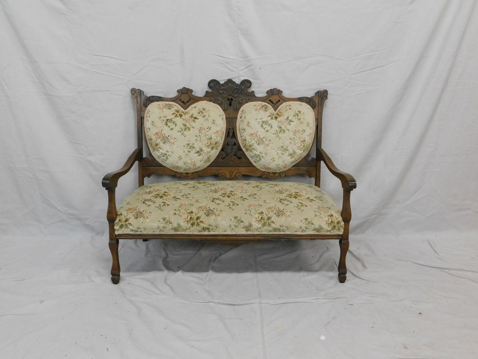 Antique Carved Settee: Antique Carved Settee with Heart Shaped Back Cushions, in good condition, 40.25''H x 48''W x 25.5''D
