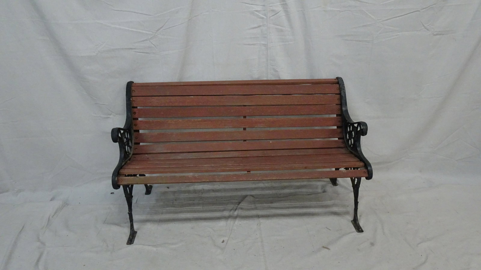 Cast Iron and Wood Park Bench: Cast Iron and Wood Park Bench, in good condition, could use fresh stain/paint, 28''H x 49.5''W x 25''D
