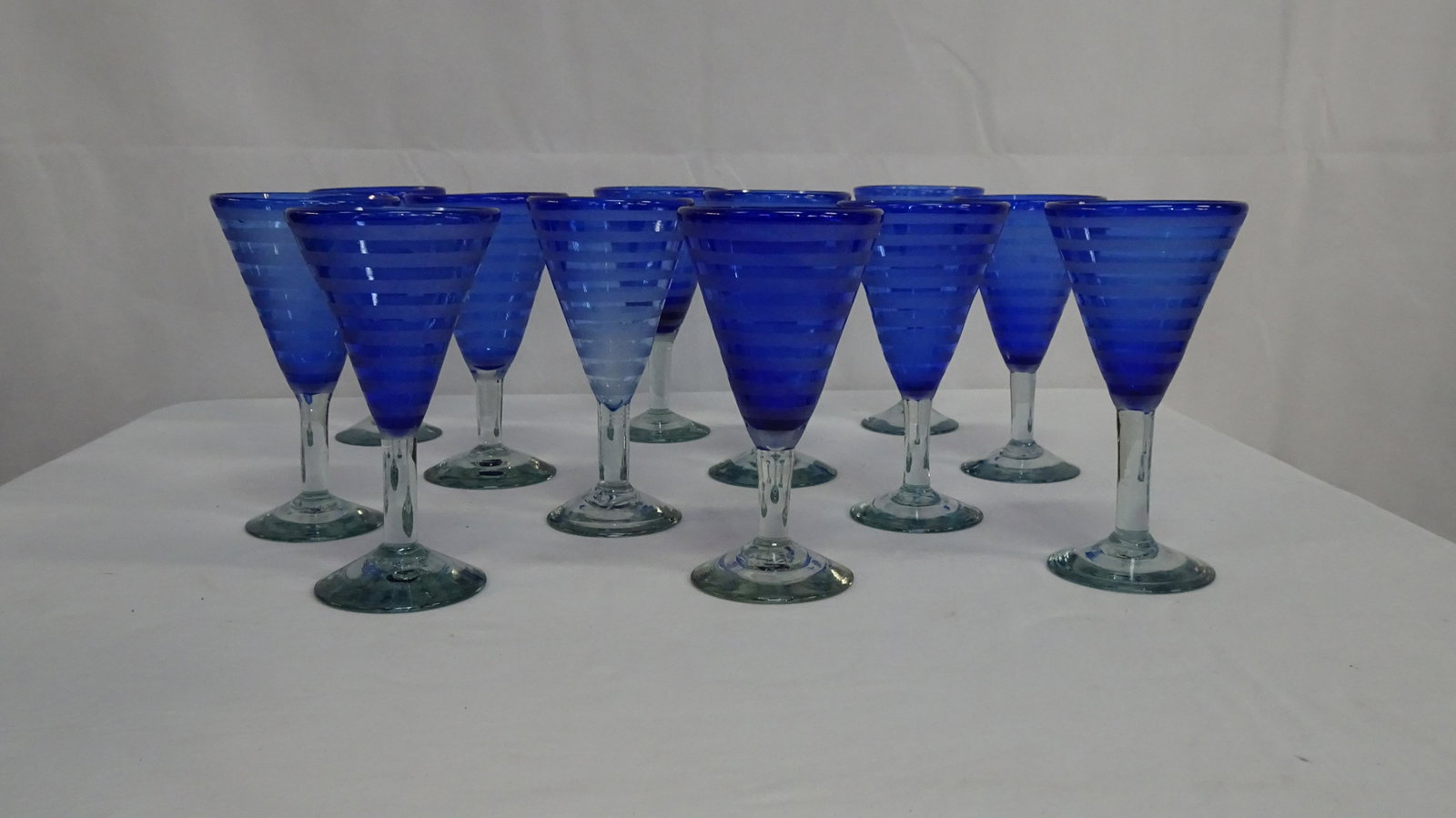 Set of 12 Blue Etched Wine Glasses: Set of 12 Blue Etched Wine Glasses in good condition. 7.25'H