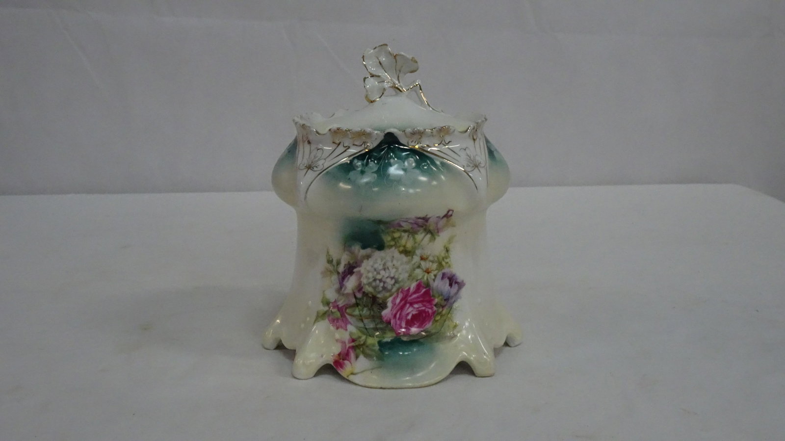 R S Prussia Biscuit Jar: R S Prussia Biscuit Jar in good condition with one tiny blemish on the rim of the lid that may be a manufacturing defect. 7"H