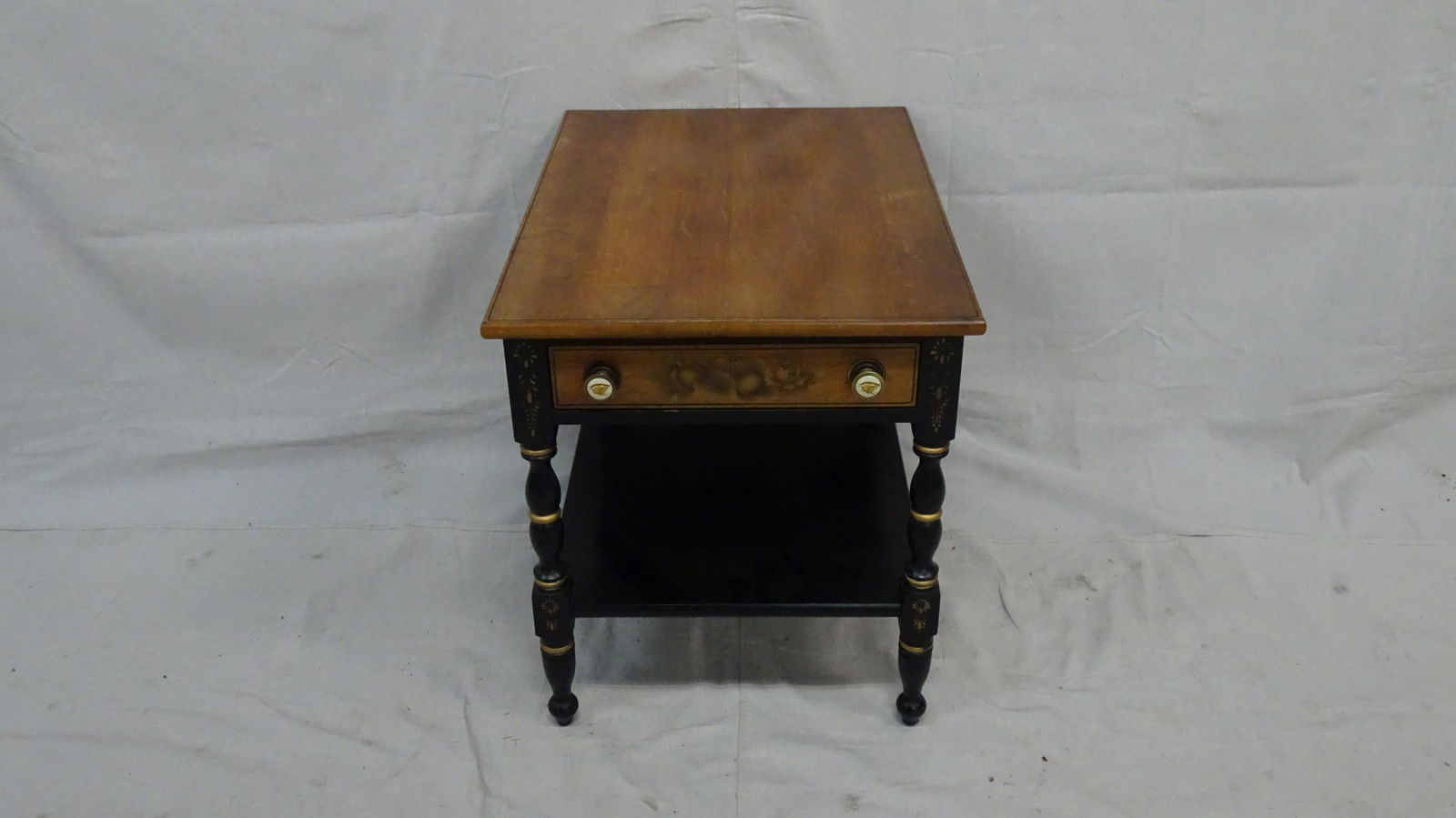Hitchcock Stenciled End Table: Hitchcock Stenciled End Table with Black and Harvest Finish, One Drawer, in good condition, 22''H x 19.25''W x 26.25''D