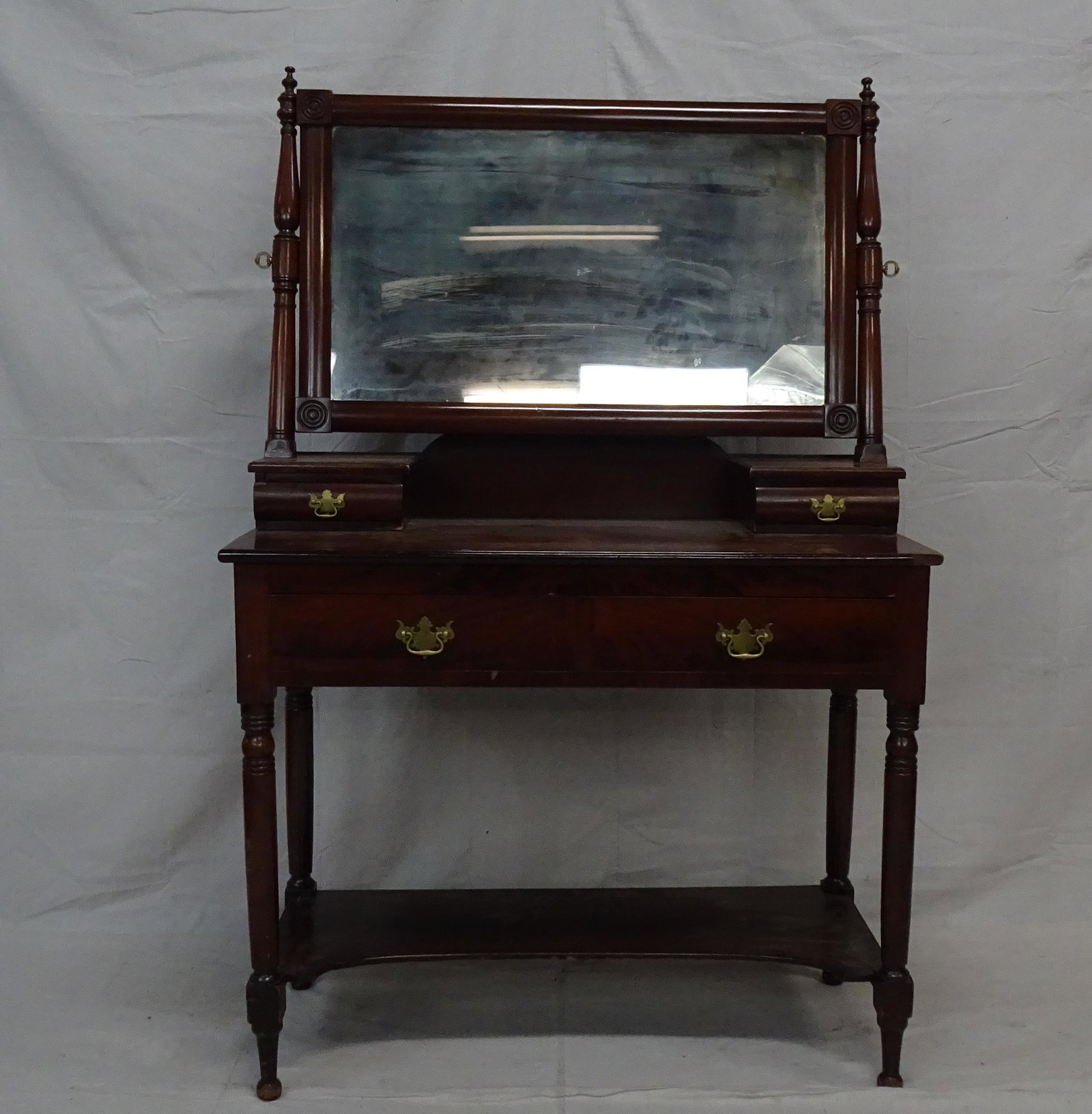 Antique Mahogany Vanity with Mirror: Antique Mahogany Vanity with Mirror in good condition, Swivel Mirror, Glove Boxes, dovetailed drawers, 69''H x 45''W x 20.5''D