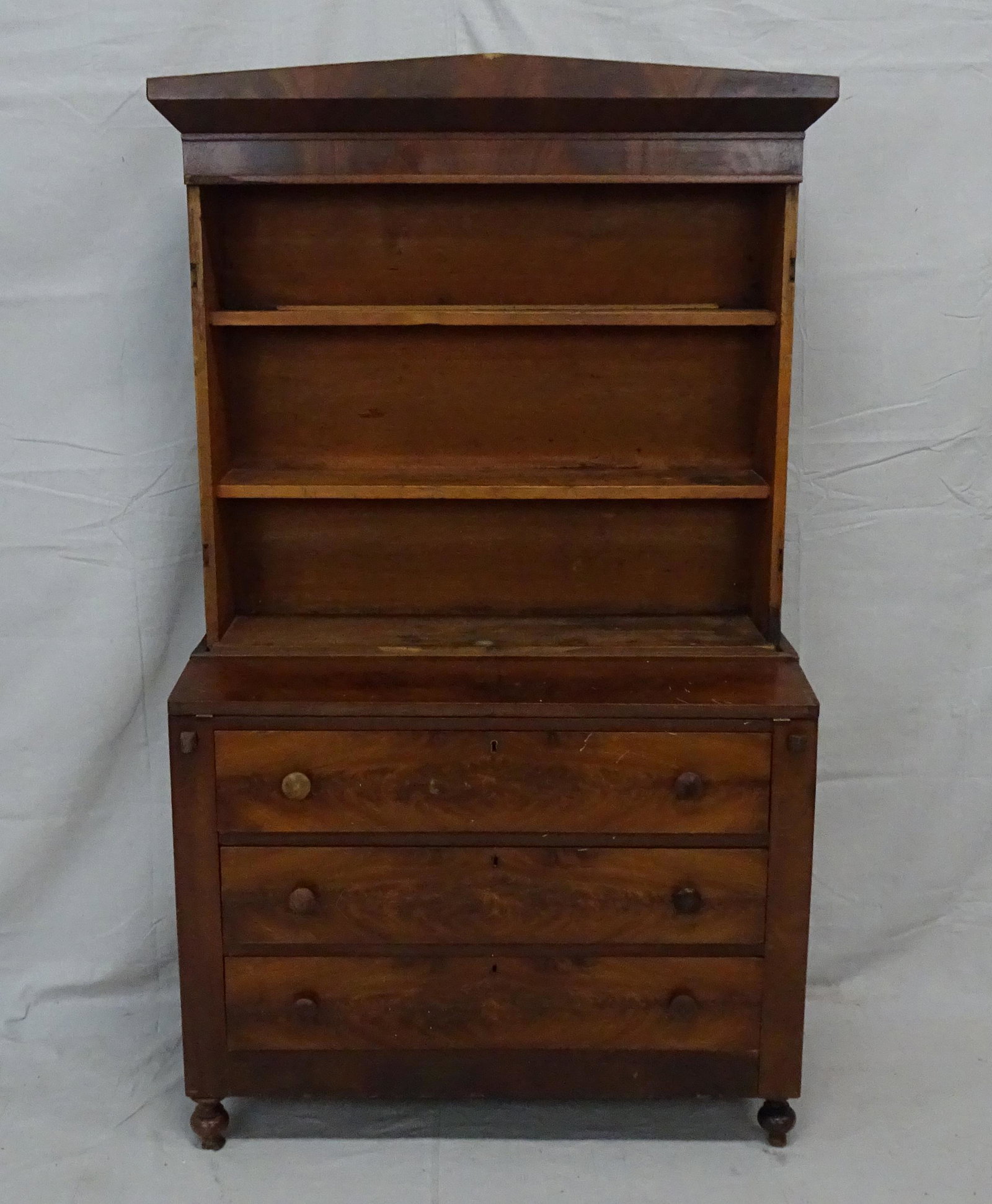 Antique Mahogany Empire Butlers Cabinet: Antique Mahogany Empire Butlers Cabinet in as found condition, drop front writing surface, 2pc cabinet, 68''H x 40''W x 19''D