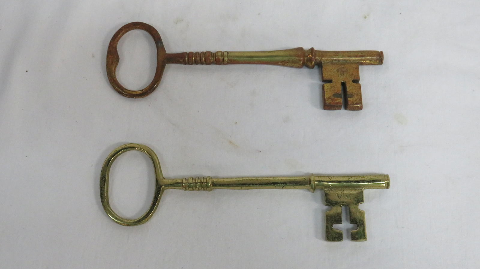 Two Virginia Metalcrafters Brass Keys (1 of 7)
