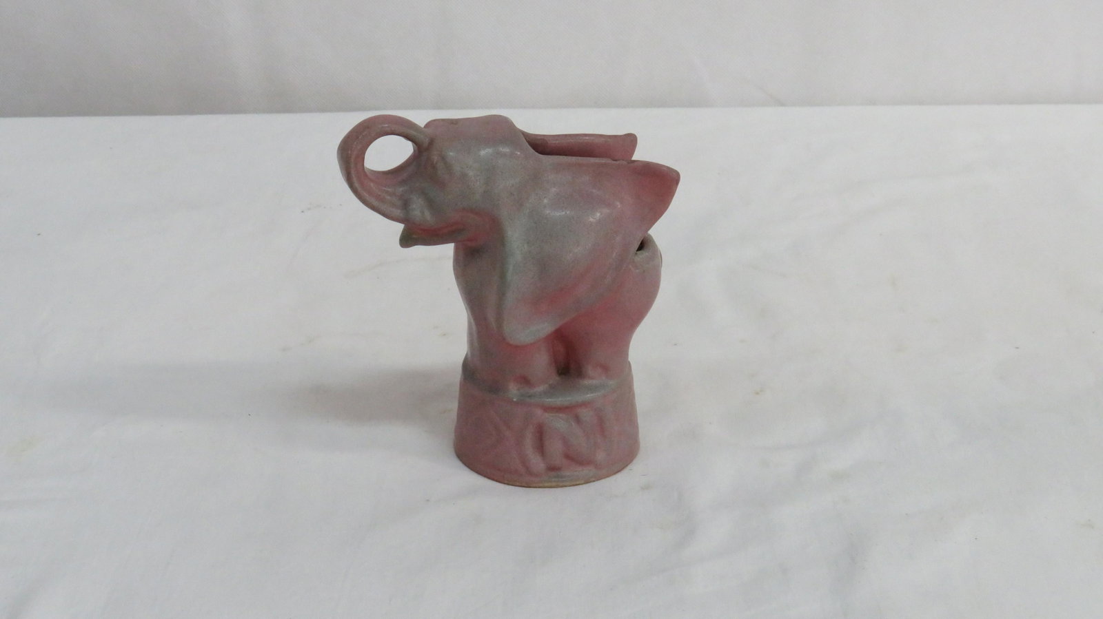 Vintage Niloak Pottery Circus Elephant Planter: Vintage Niloak Pottery Circus Elephant Planter in good condition. Impressed mark on the bottom.6"H