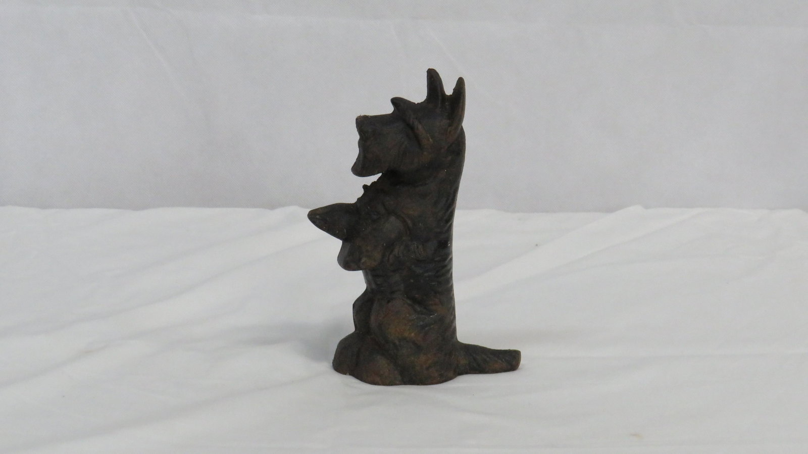 Vintage Cast Iron Scottish Terrier Dog Door Stop: Vintage Cast Iron Scottish Terrier Dog Door Stop in good condition. 8.25"H