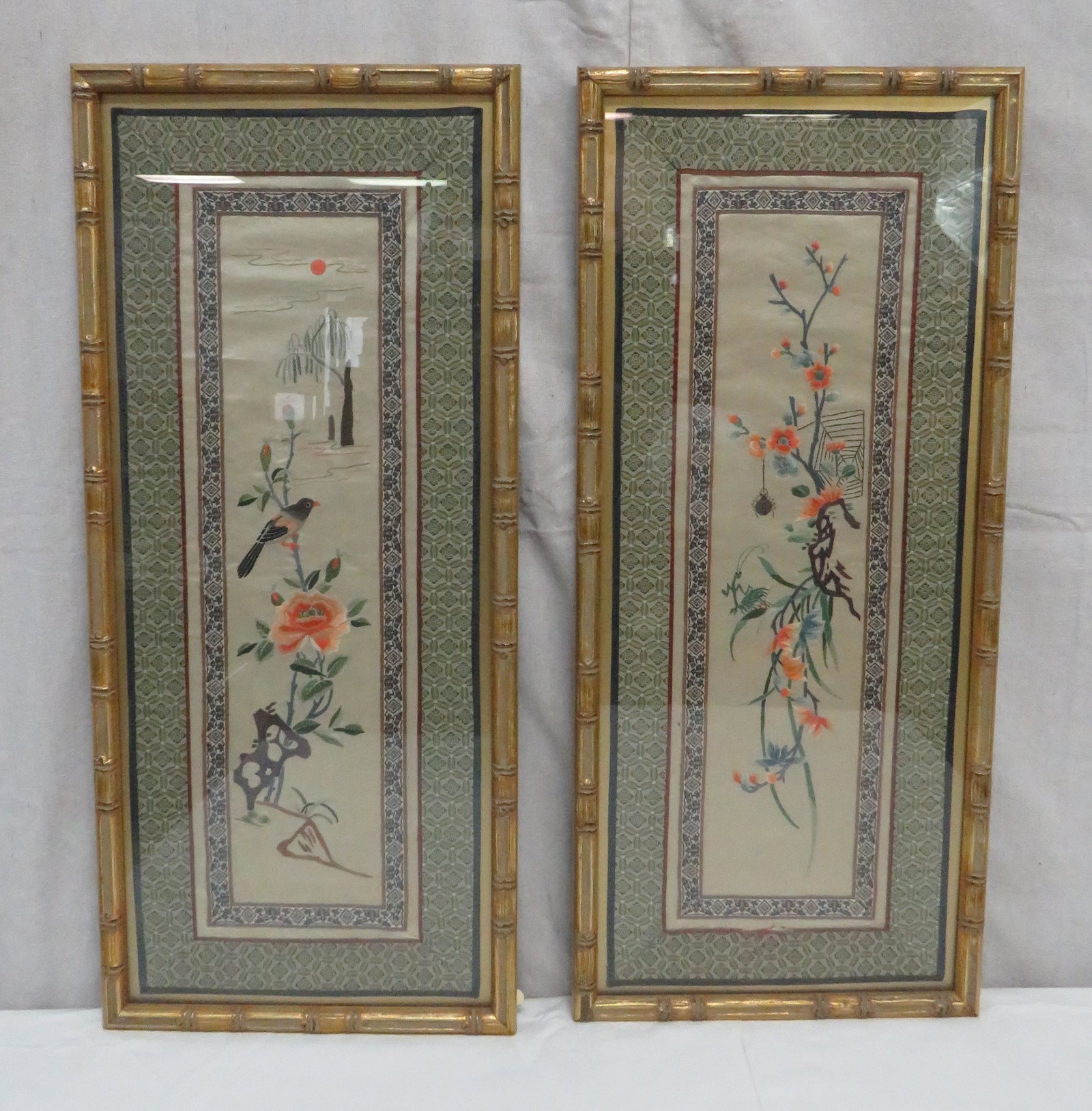 Pair of Framed Oriental Silk Embroidery: Pair of Framed Oriental Silk Embroidery in good condition. Overall frame size 27" x 12"