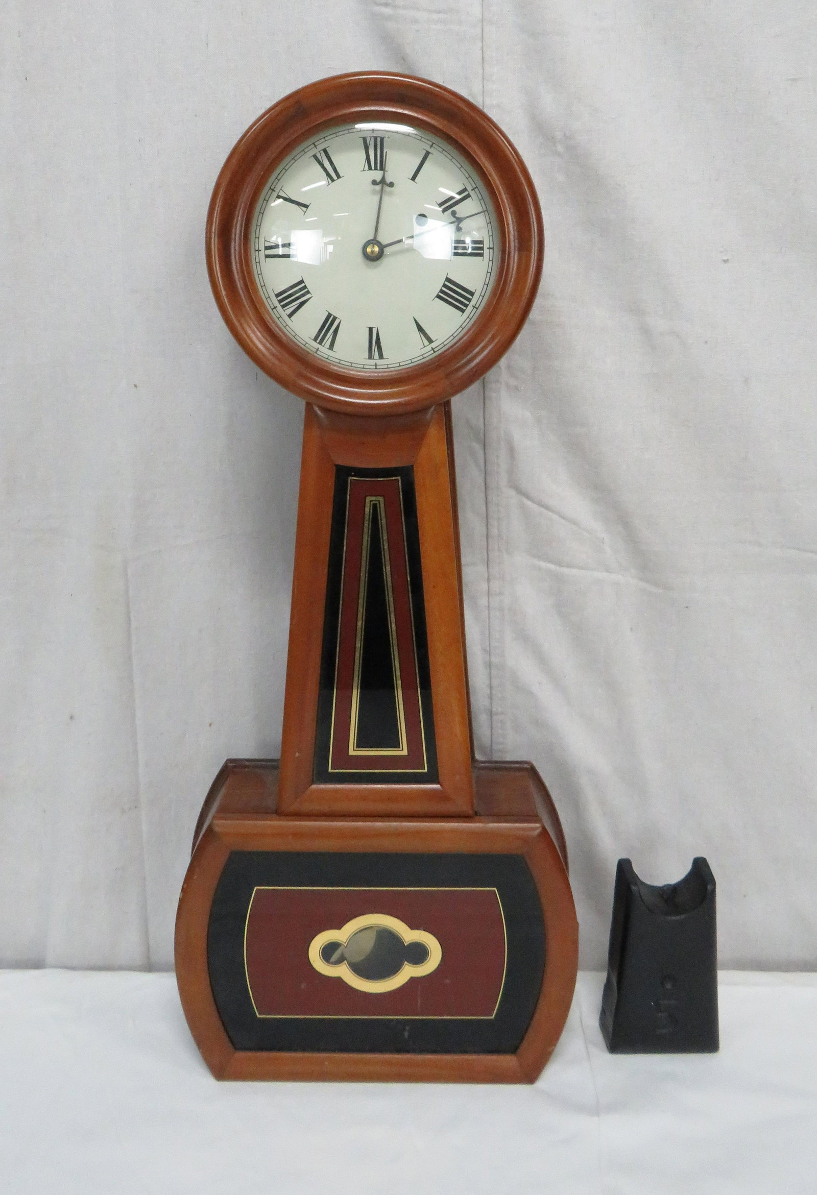 Replica E. Howard of Boston Banjo Clock: Replica E. Howard of Boston Banjo Clock in good condition. Key wind and weight driven clock. Nice quality craftsmanship. May require some repair work. Sold with no warranties or guarantees. 29'H x 12"