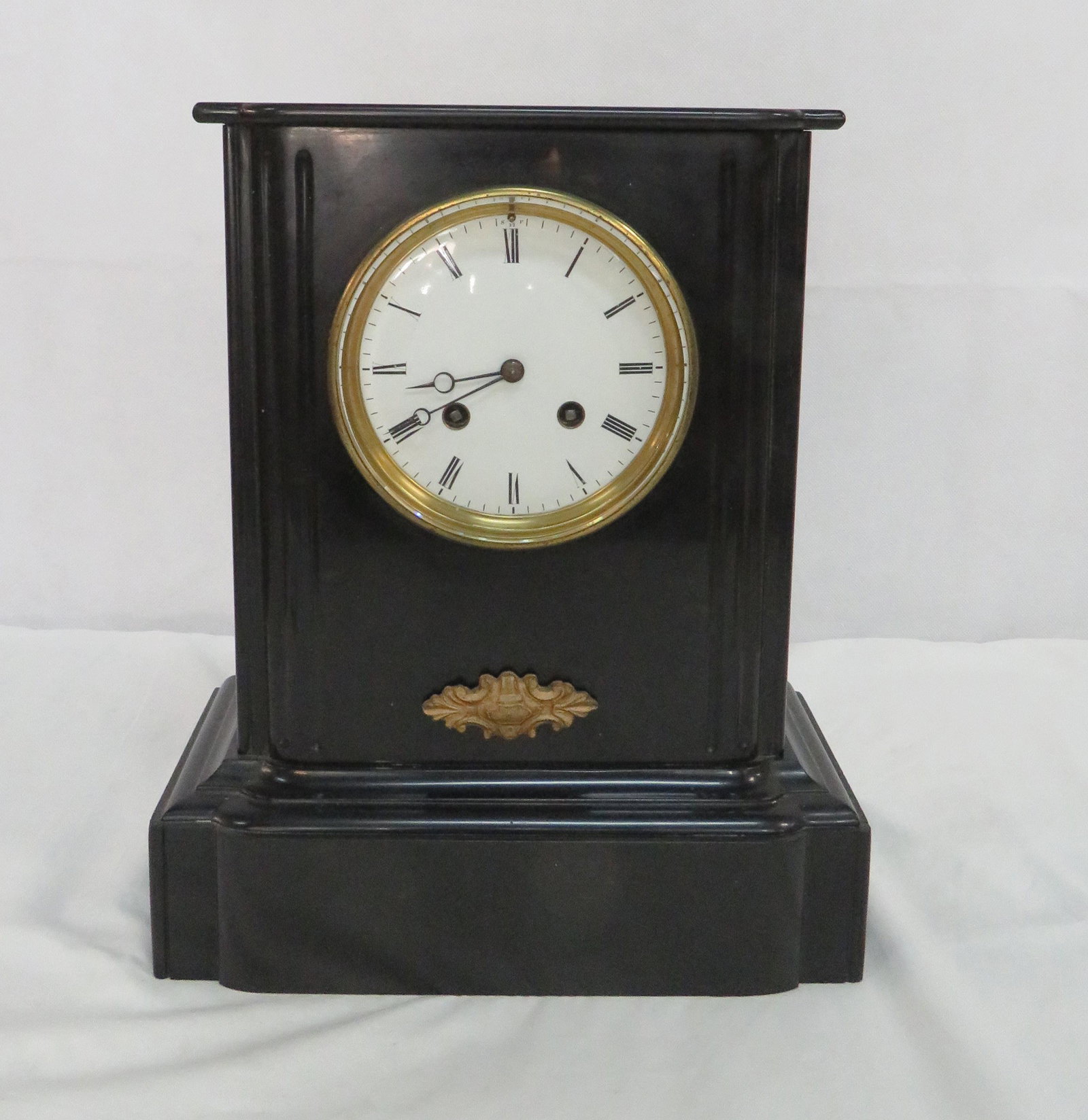 19th Century W C Shaw Paris Slate Mantel Clock: 19th Century W C Shaw Paris Slate Mantel Clock in very good condition. Beveled glass bezel and clear glass back. Two hole porcelain face with roman numerals. Strikes on the hour and half hour. Brass m