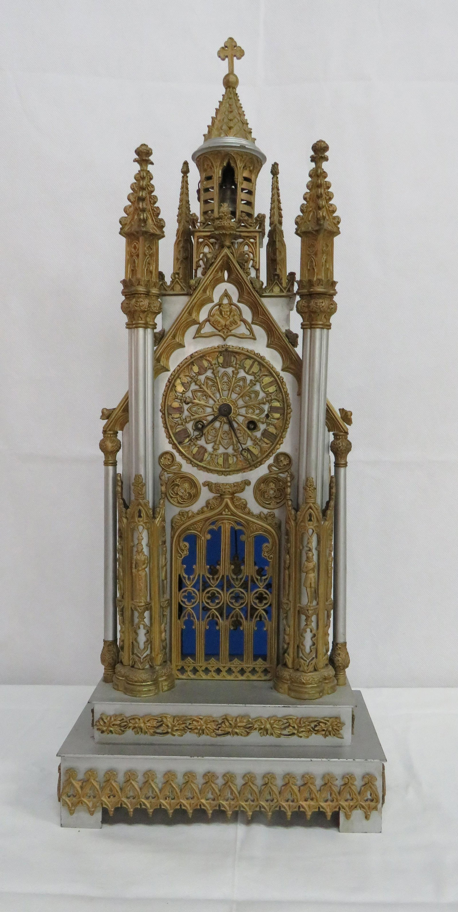 19th Gothic Revival Cathedral Shelf Clock: 19th Gothic Revival Cathedral Shelf Clock in good condition. Brass works are numbered but no obvious maker's mark. Running when cataloged. Sold with no warranties or guarantees as most all clocks requ