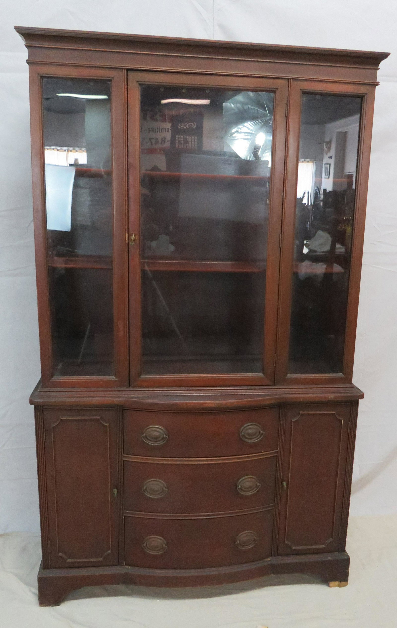 Mahogany Duncan Fyfe China Cabinet: Mahogany Duncan Fyfe China Cabinet in as found condition, some veneer damage, Bowfront, 69''H x 42''W x 18''D