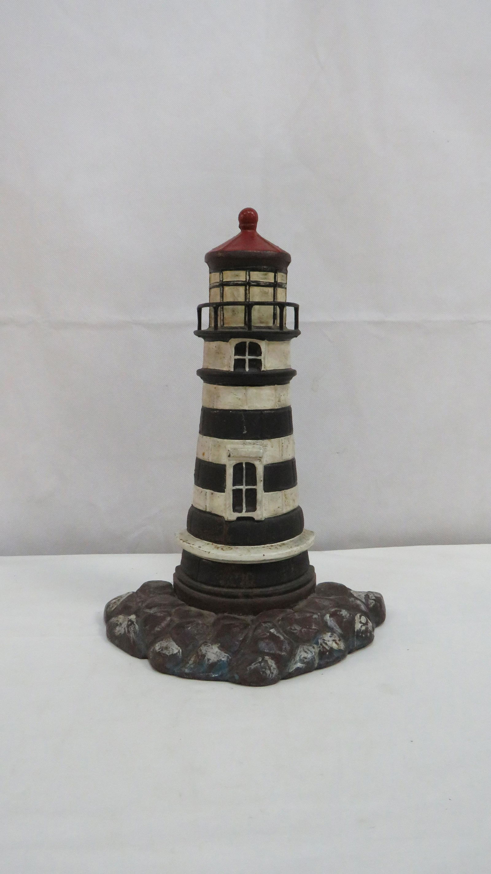 Large Vintage Cast Iron Light House Door Stop (1 of 2)