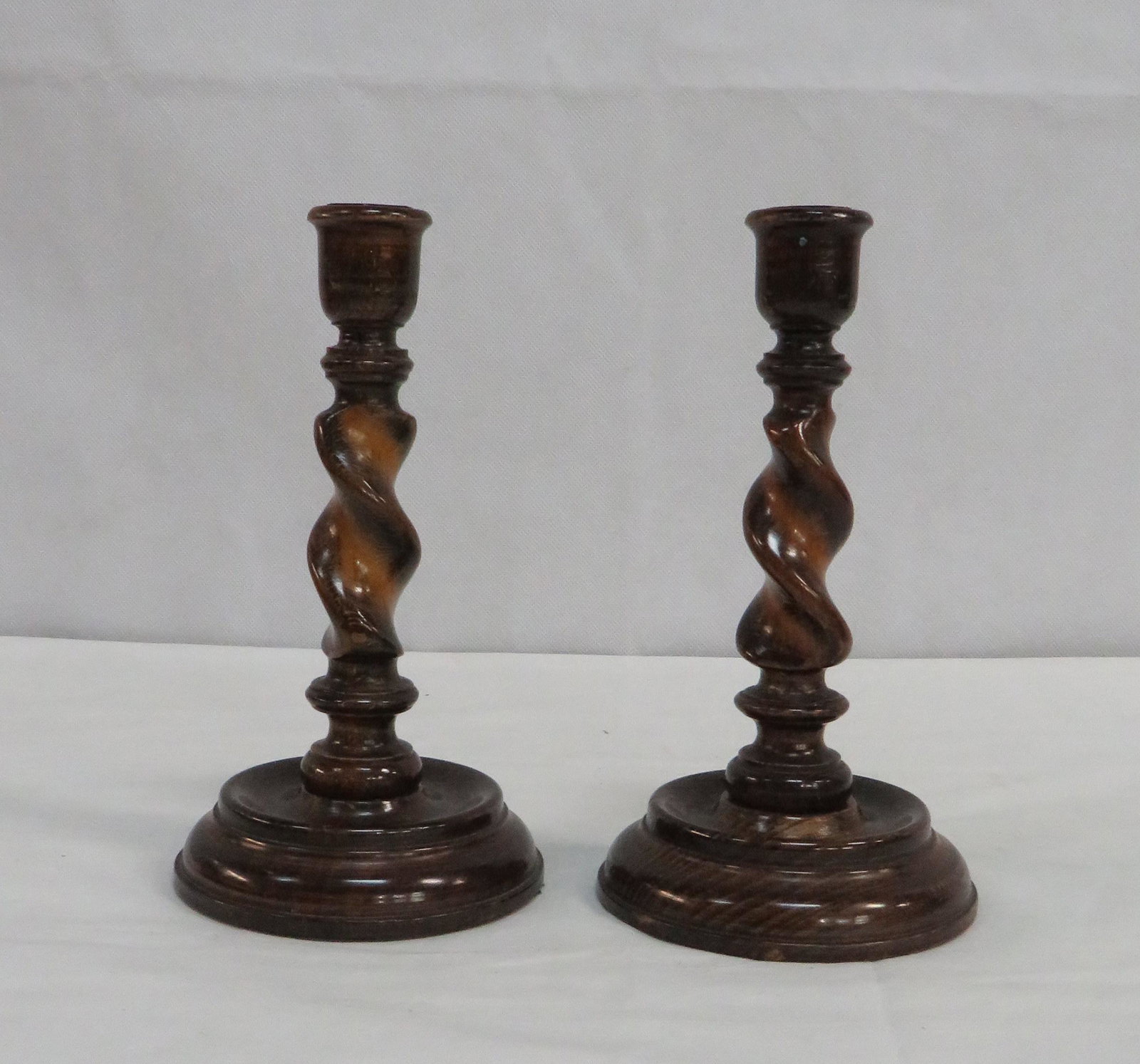 Antique English Oak Barley Twist Candlesticks: Antique English Oak Barley Twist Candlesticks with small chip on top rim. 8"H