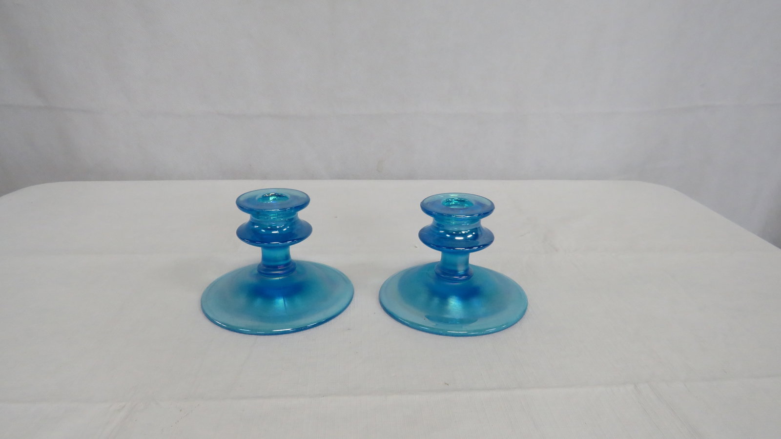 Vintage Fenton Blue Stretch Glass Candleholders: Vintage Fenton Blue Stretch Glass Candleholders in good condition. Marked on the bottom. 3.25"H