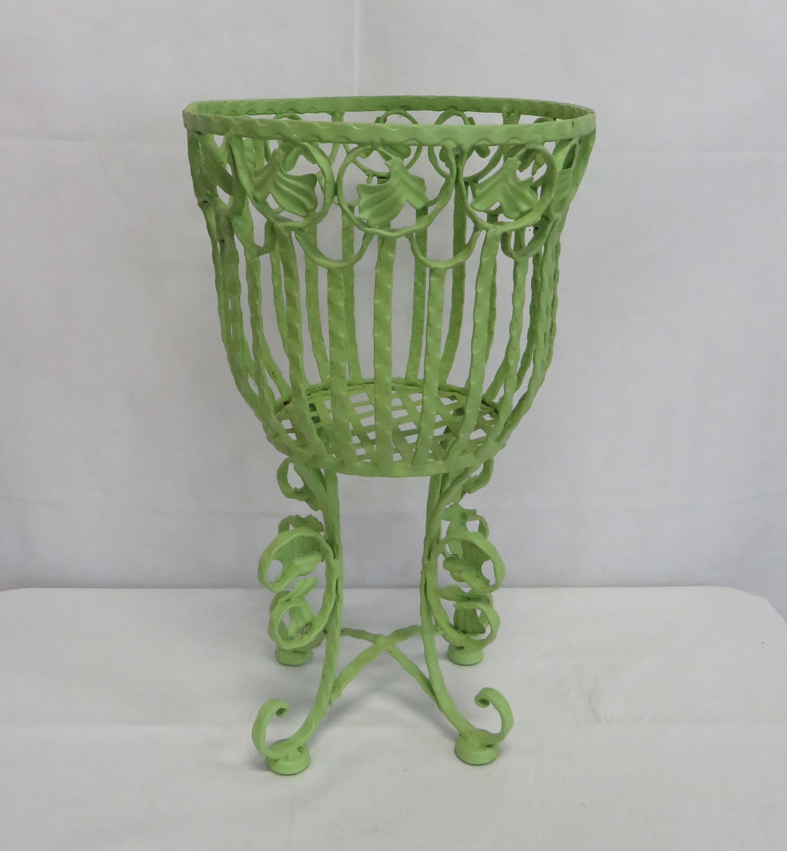 Wrought Iron Garden Planter: Wrought Iron Garden Planter in good condition. 21"H x 12"D