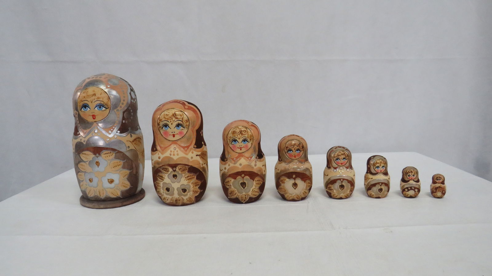 Vintage 8 Layer Russian Nesting Dolls: Vintage 8 Layer Russian Nesting Dolls in good condition. Signed on the bottom. Hand carved and painted. Largest doll 9"H