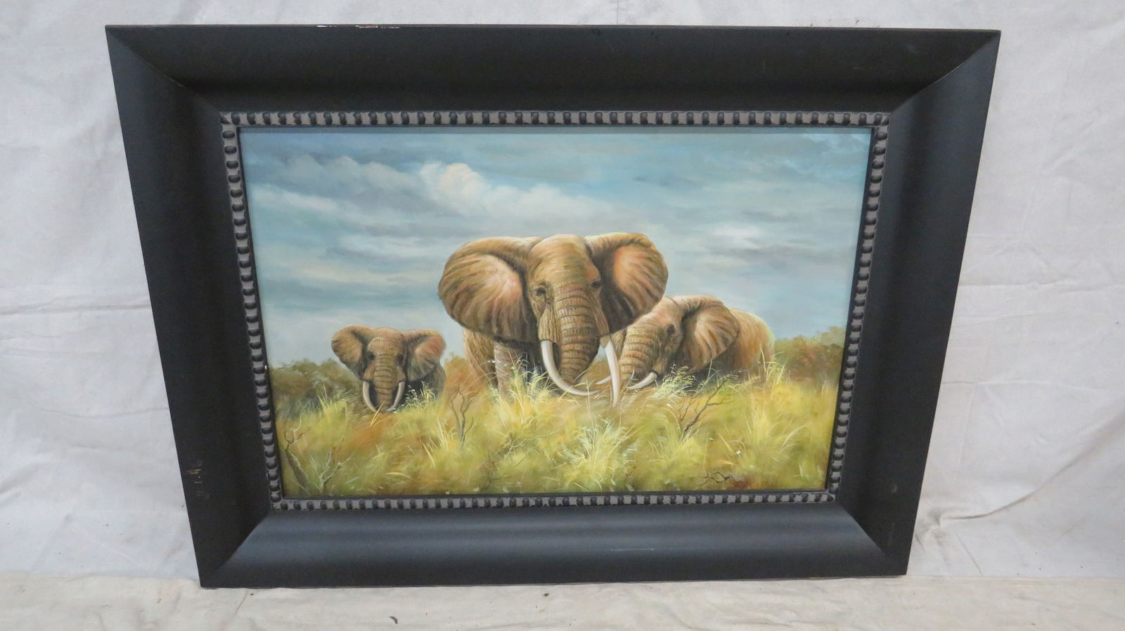 Stampede of Elephants Oil Painting in Frame: Stampede of Elephants Oil Painting in Frame in good condition, 34'' x 46''