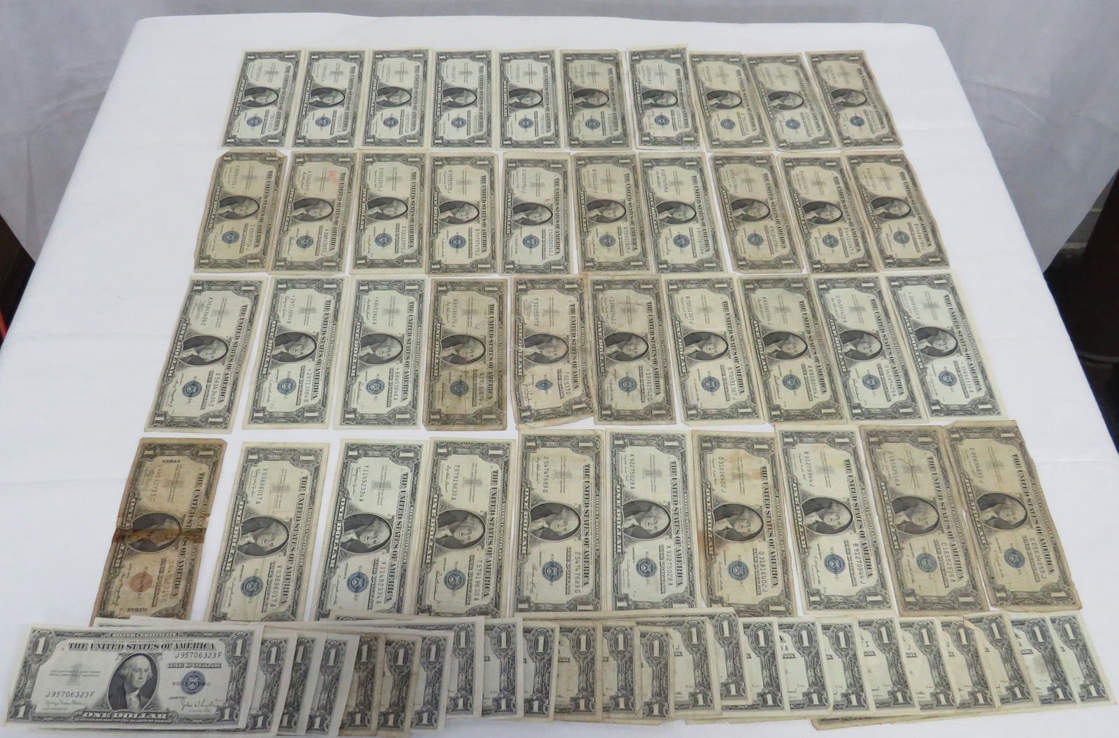 64 $1 Silver Certificates Including 1935 Hawaii (1 of 1)