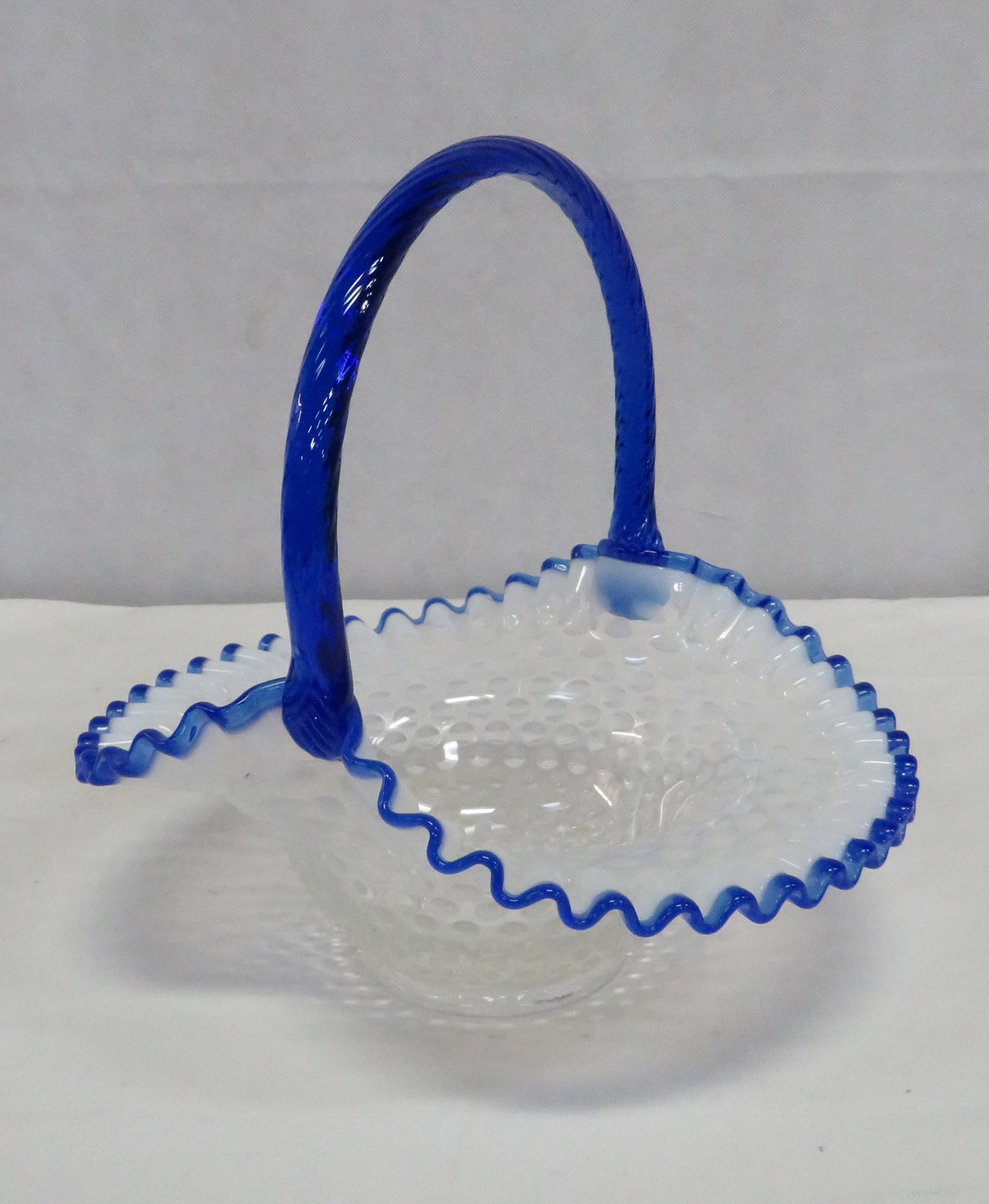 Fenton Blue Sapphire Crest Opalescent Basket: Fenton Blue Sapphire Crest Opalescent Basket in good condition. 10"H x 10"D