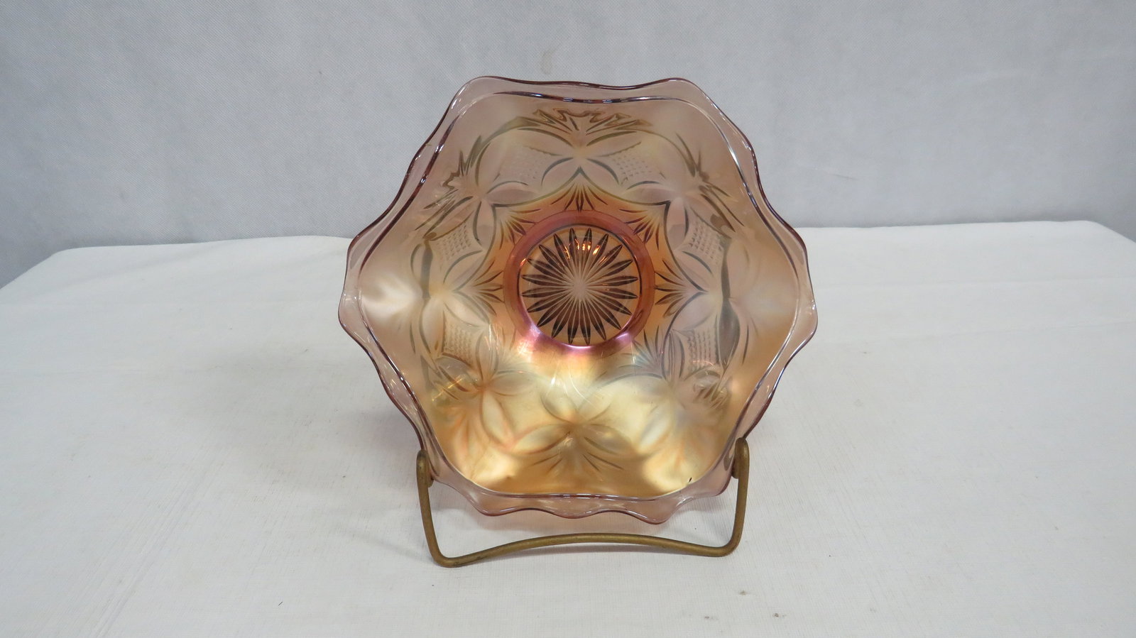 Amethyst Westmoreland Carnival Glass Bowl: Amethyst Westmoreland Carnival Glass Bowl Pillow and Sunburst Pattern in good condition.2.75"H x 8.25"D