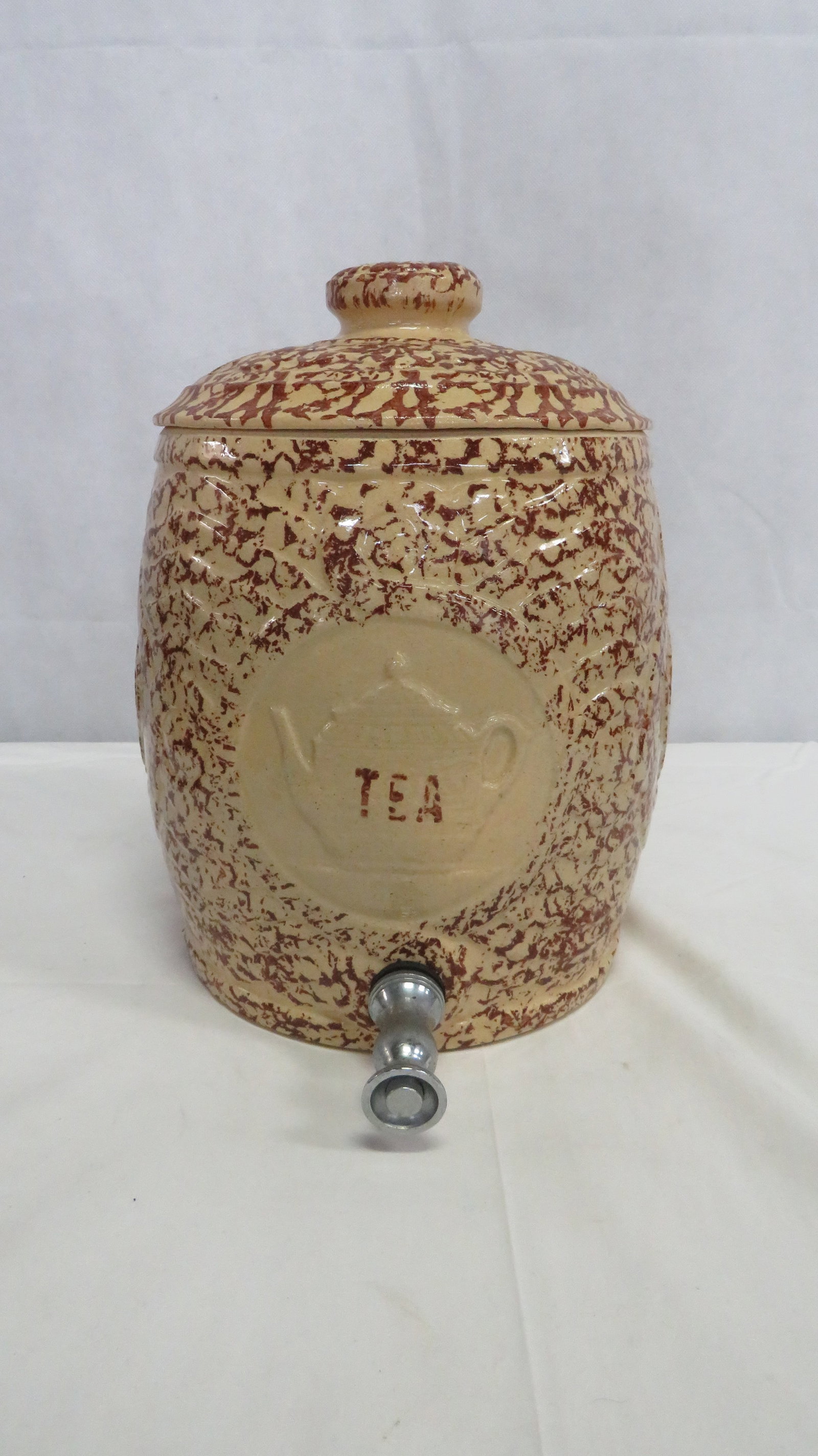 Brown Spongeware USA Crock Tea Cooler: Brown Spongeware USA Crock Tea Cooler in good condition with some crazing. 12"H