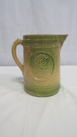Antique Stoneware Indian Head Pitcher