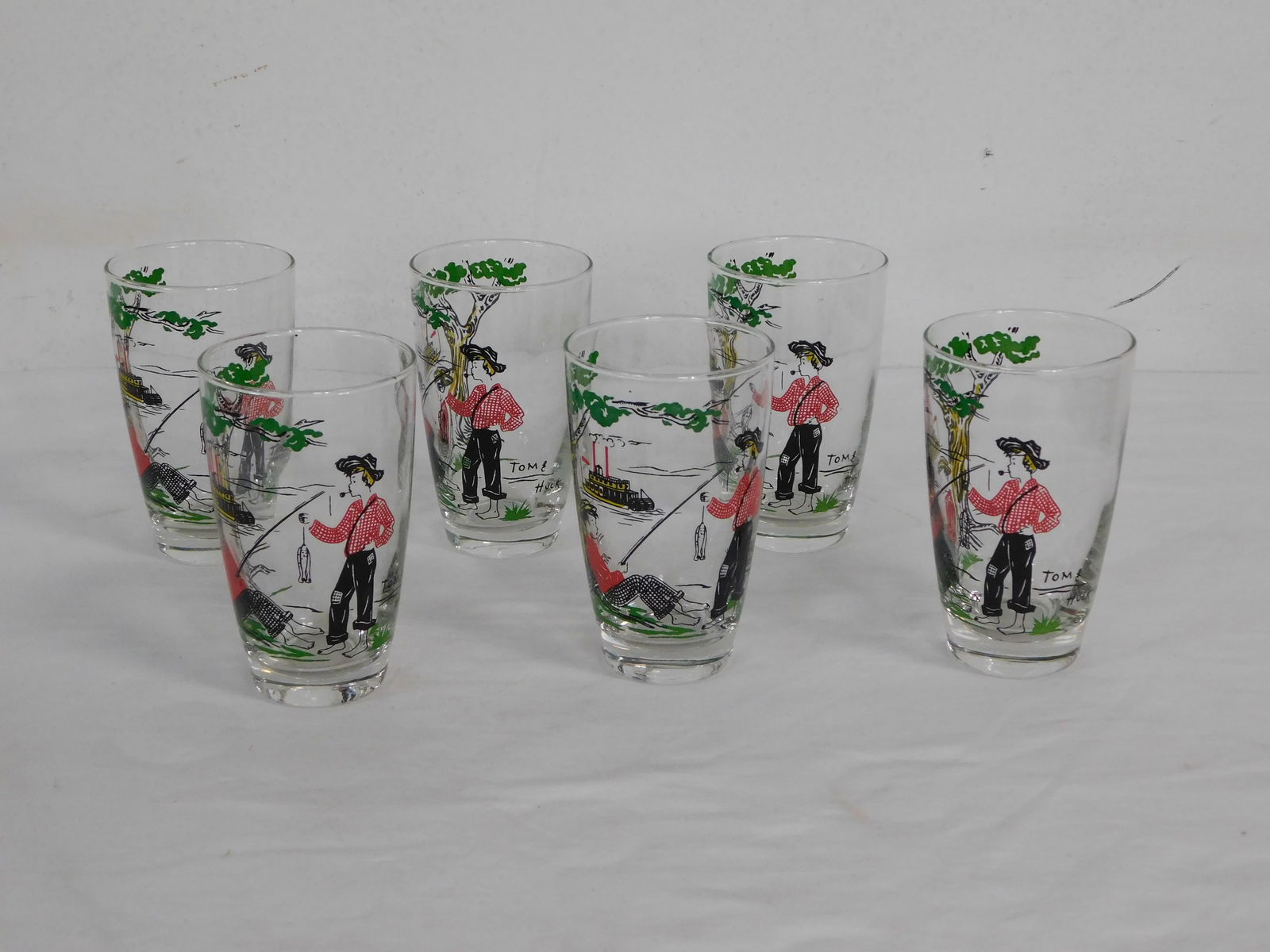 Vintage Libby Tom Sawyer Huck Finn Glasses Set: Vintage Libby Tom Sawyer Huck Finn Glasses Set of 6. 5.25" H in good condition.