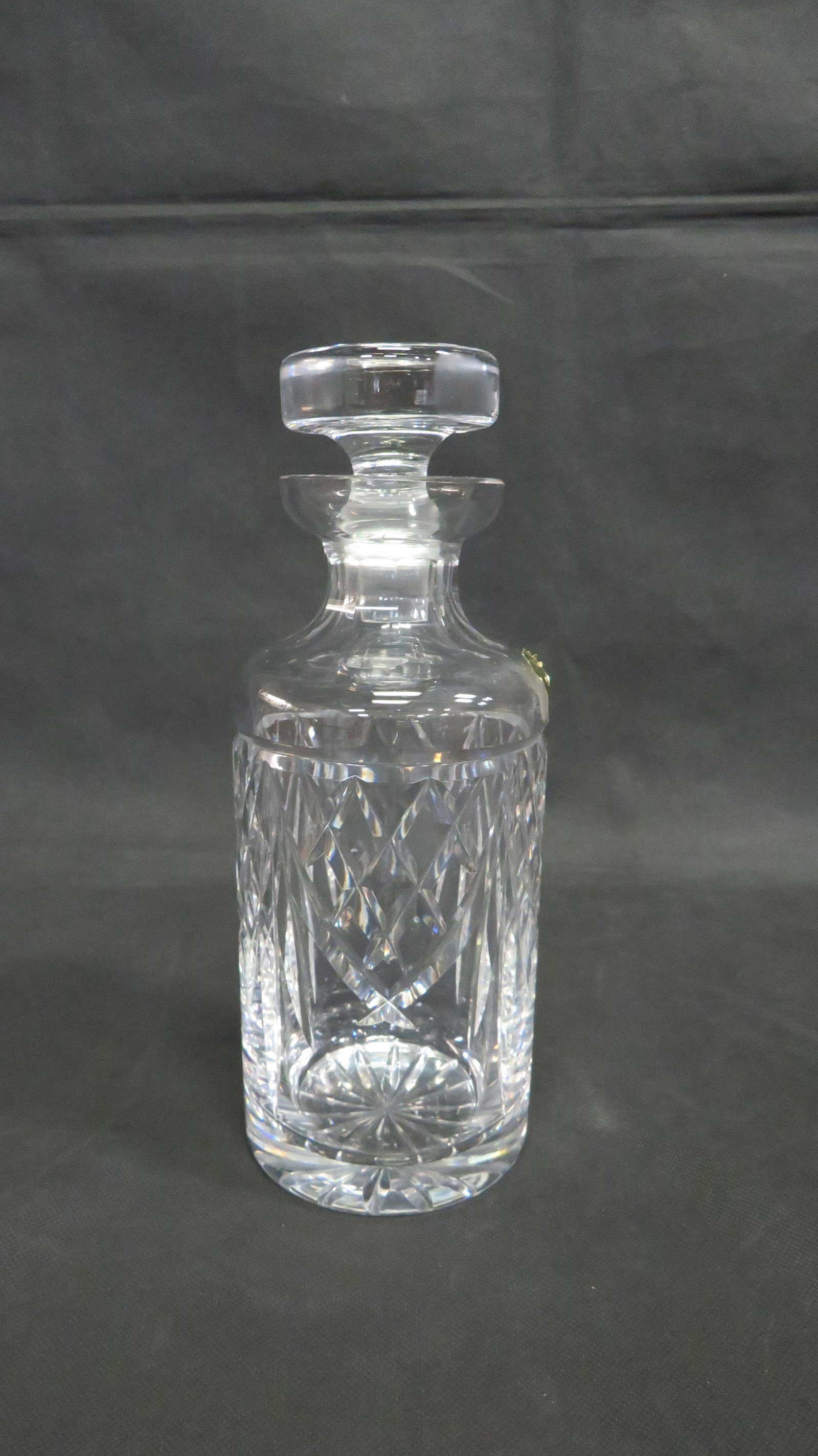 Vintage Waterford Crystal Decanter: Vintage Waterford Crystal Decanter in good condition. Paper label. 9.5"H