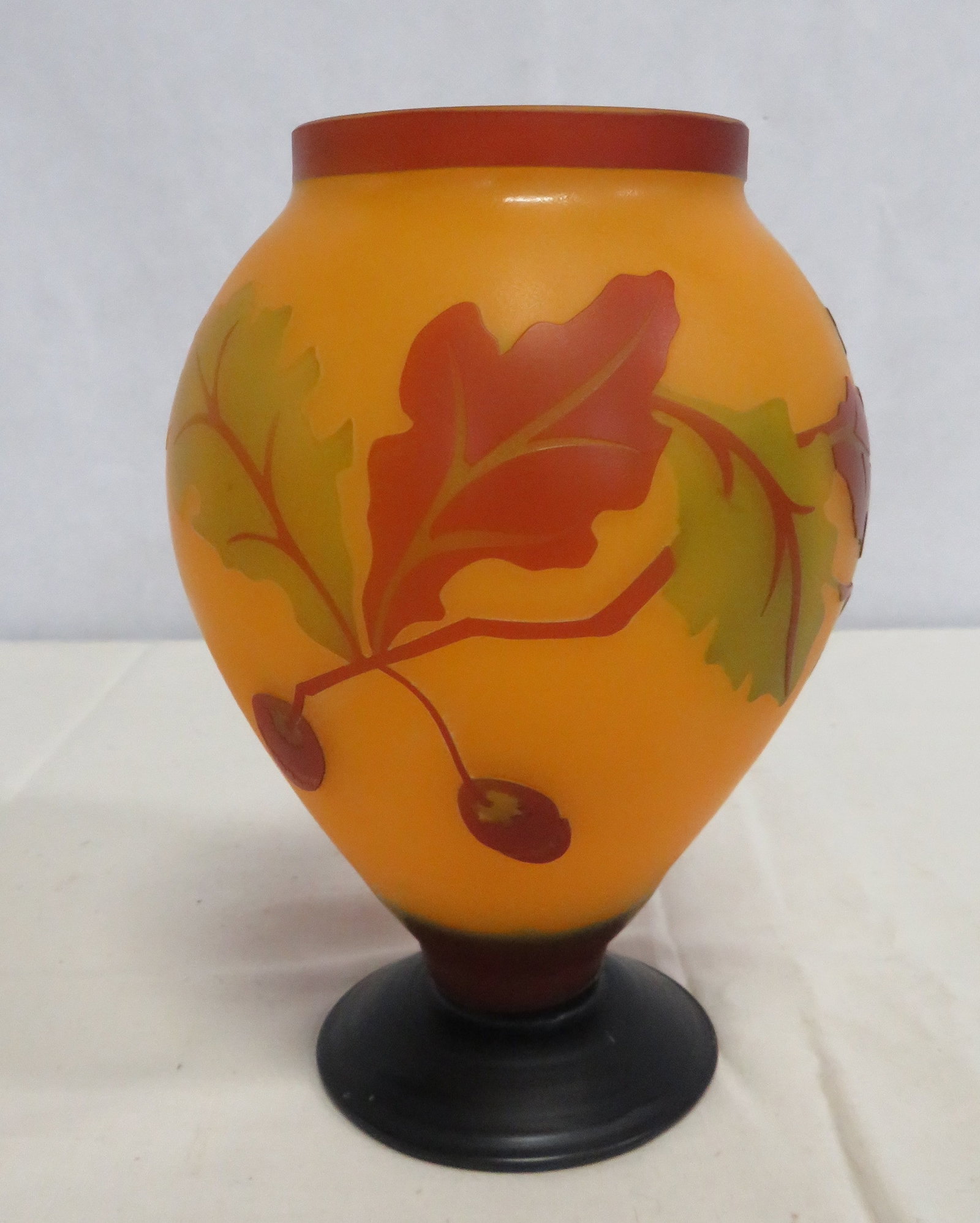 Vintage Cameo Art Glass Vase: Vintage Cameo Art Glass Vase in good condition. Carved oak leaves and acorns. 7.5"H x 5.25"D