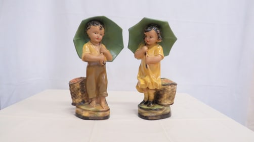 Antique Chalkware Umbrella Twins Statues