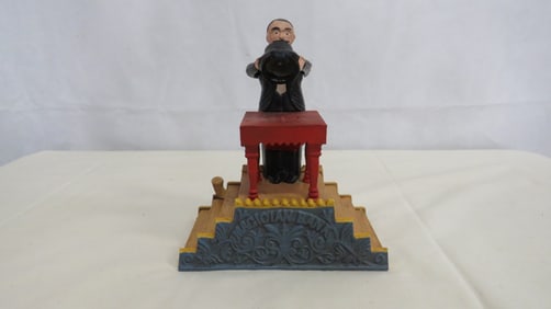 Vintage Cast Iron Mechanical Magician Bank