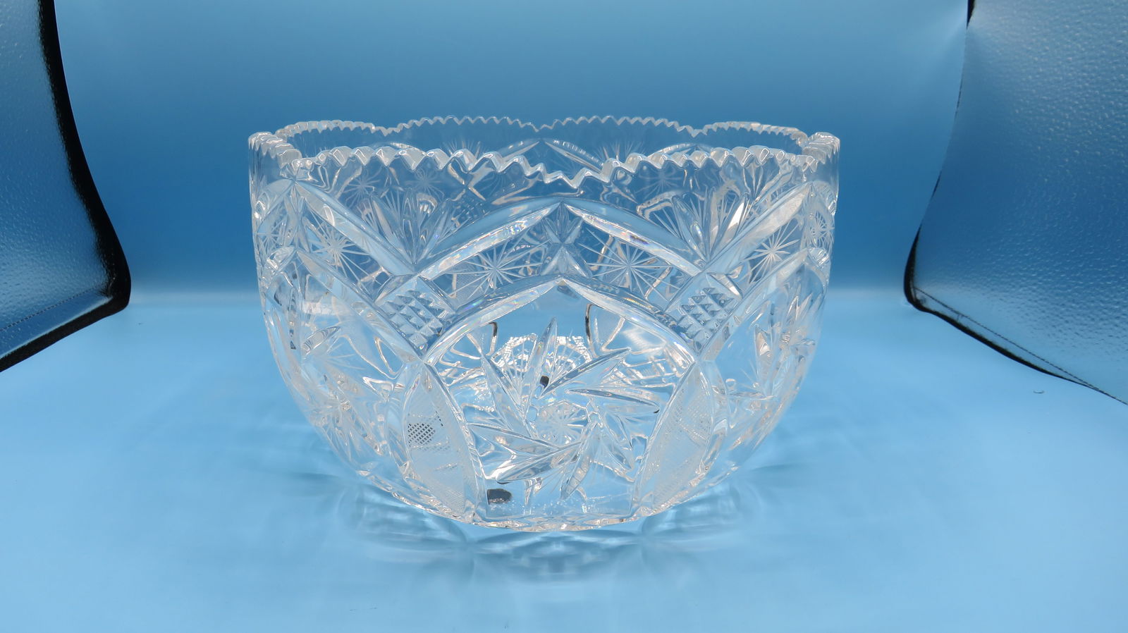 Williamsburg by Avitra 10" Crystal Center Bowl: Williamsburg by Avitra 10" Crystal Center Bowl in good condition. Sawtooth edge with repeating pinwheel, pineapple, and star design. Impressive and large etched crystal center bowl. 6.5"H x 10"D