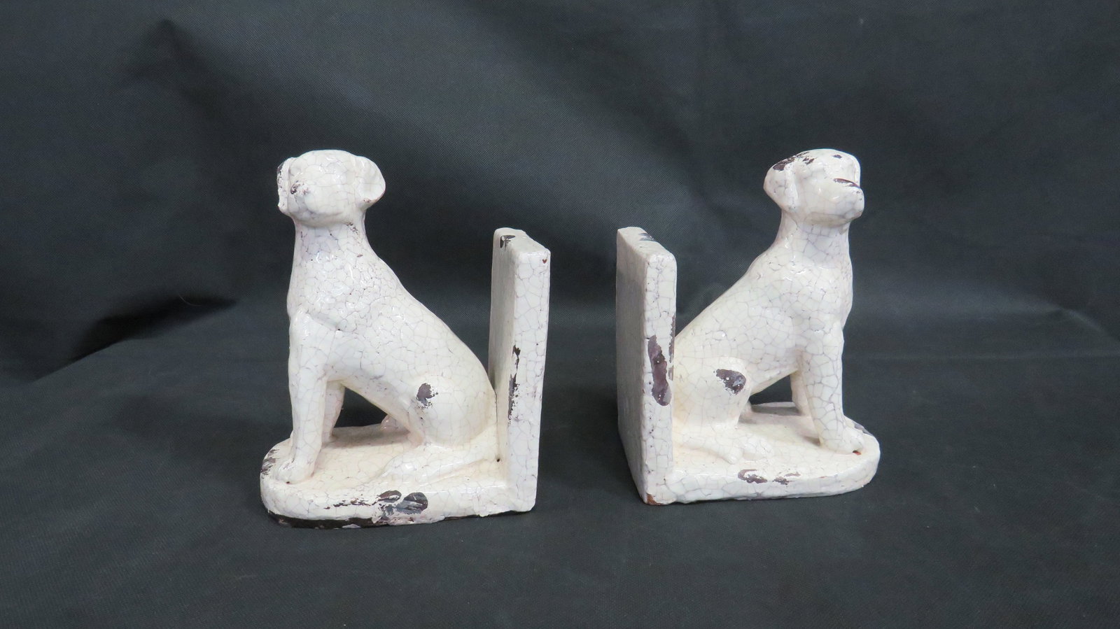 Vintage Redware Pottery Dog Bookends: Vintage Redware Pottery Dog Bookends in good condition. Books not included in this lot. 7"H x 6"L x 4"W