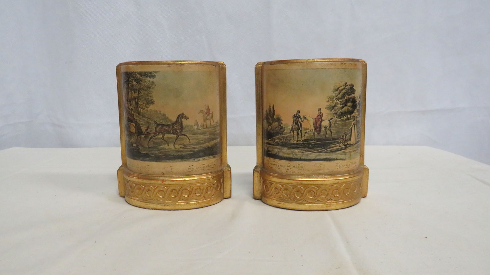 Vintage Borghese Gold Leaf Bookends: Vintage Borghese Gold Leaf Bookends in good condition. French equestrian scenes. 6.25"H x 5.25"W