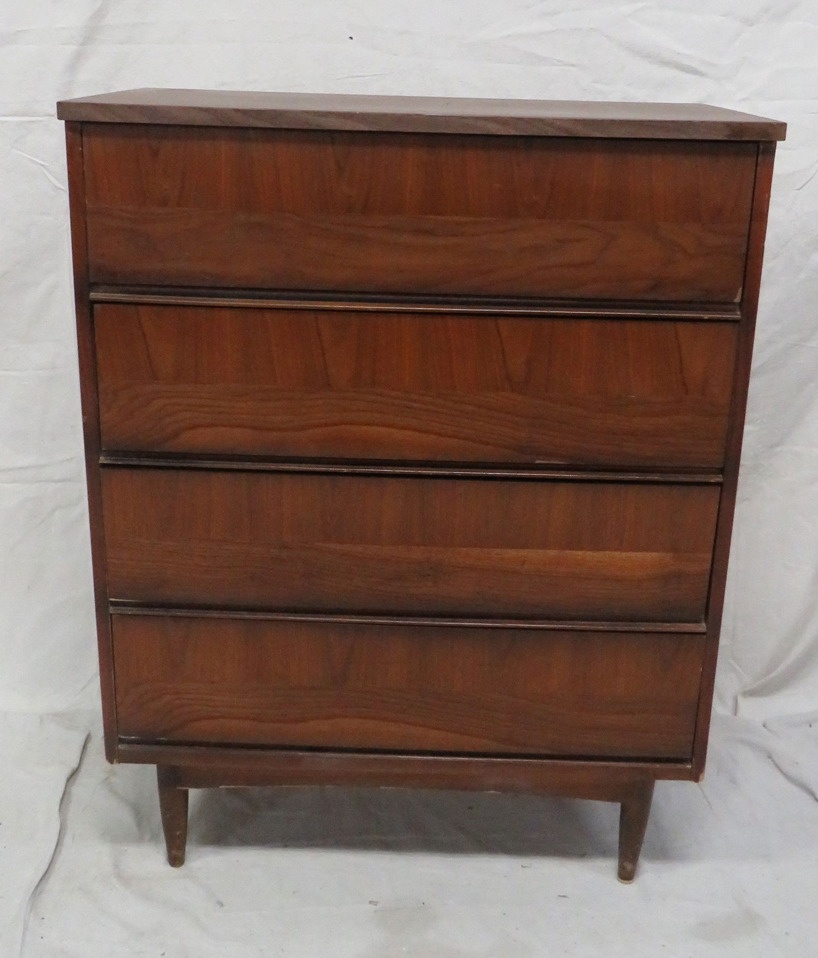 Mid Century Modern Walnut Chest of Drawers: Mid Century Modern Walnut Chest of Drawers in good condition, some small veneer loss to bottom on side, Dovetailed Drawers, 44''H x 34''W x 18''D