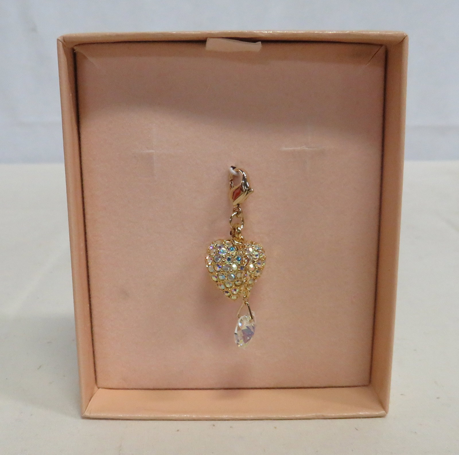 Kirk's Folly "Aura" Heart Charm: Kirk's Folly "Aura" Heart Charm in new condition. Gold tone with aurora borealis crystals.
