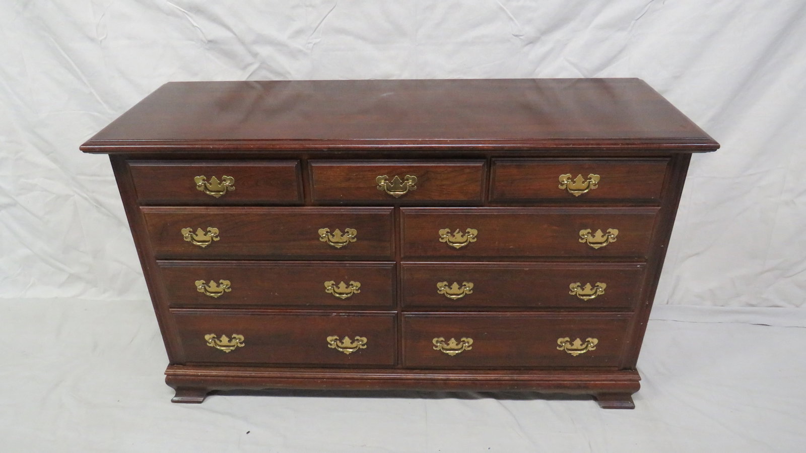 Vintage Cherry Traditional Dresser: Vintage Cherry Traditional Dresser in good condition, Dovetailed Drawers with Brass Hardware, 33.5''H x 56''W x 19''D