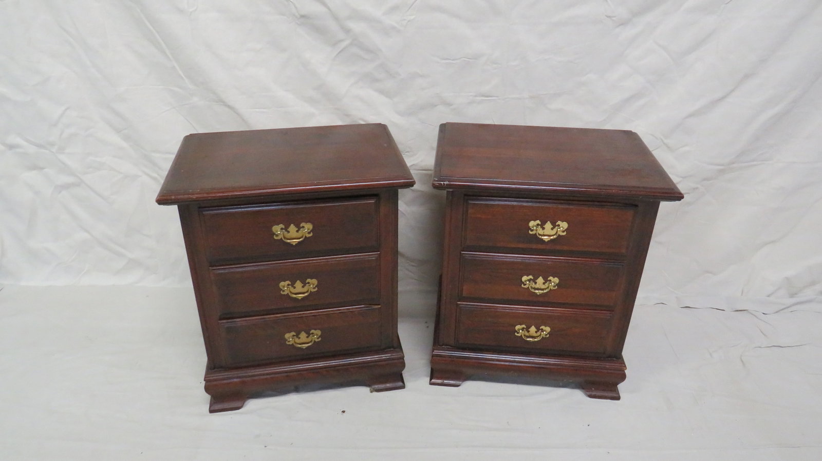 Vintage Cherry Traditional Nighstands: Vintage Cherry Traditional Nighstands in as found condition, damage to drawer faces, top shows wear, should be refinished or repurposed, 26.5''H x 23''W x 16.5''D