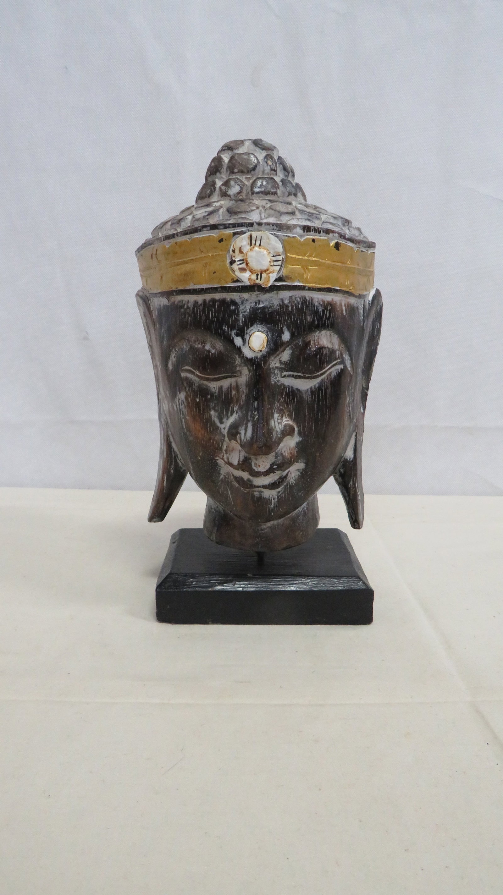 Hand Carved Wooden Buddha Head on Stand: Hand Carved Wooden Buddha Head on Stand in good condition. 11.5"H x 6"L x 6"W